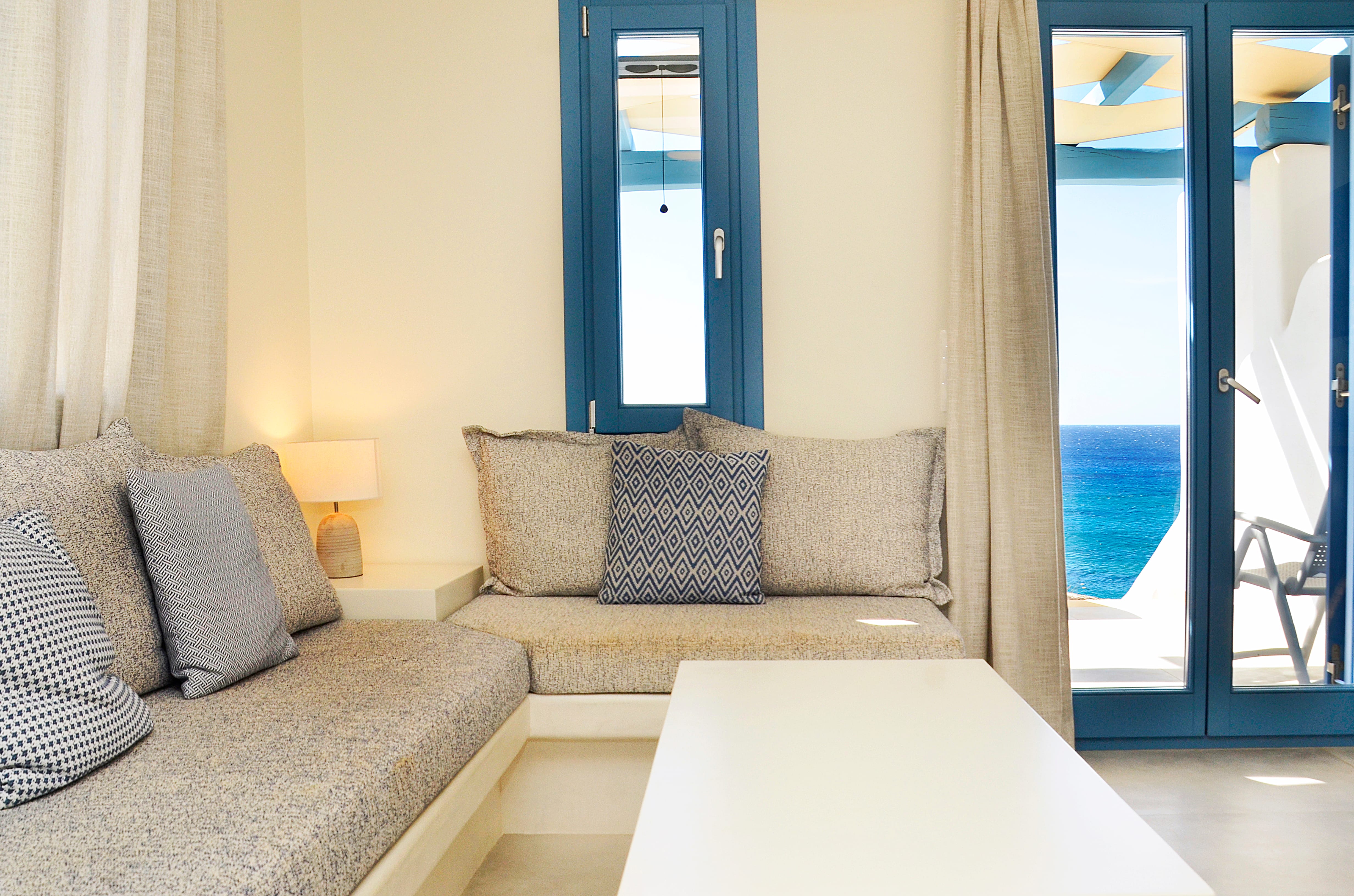 a room with a table and chairs