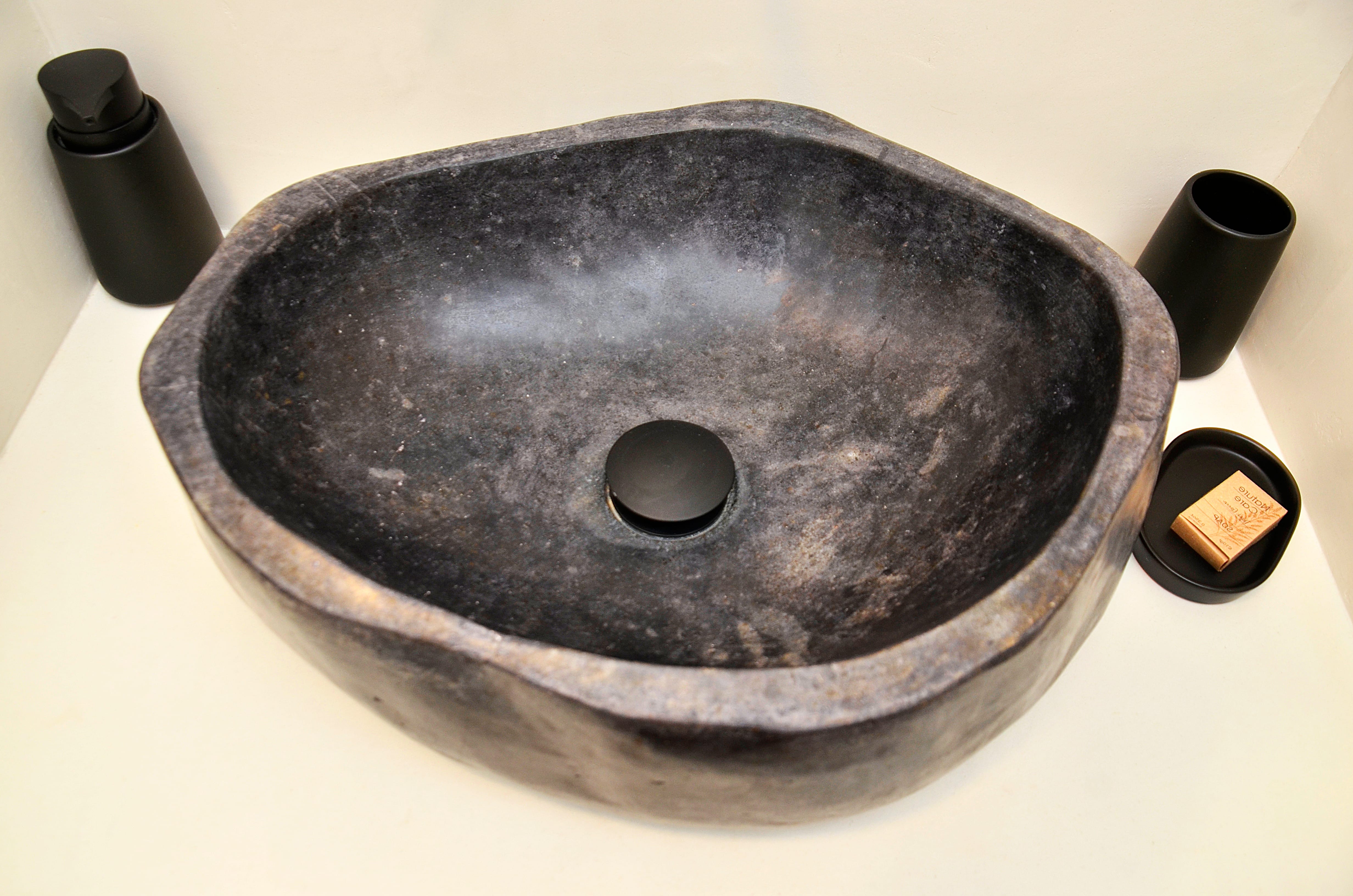 a black pan with a handle