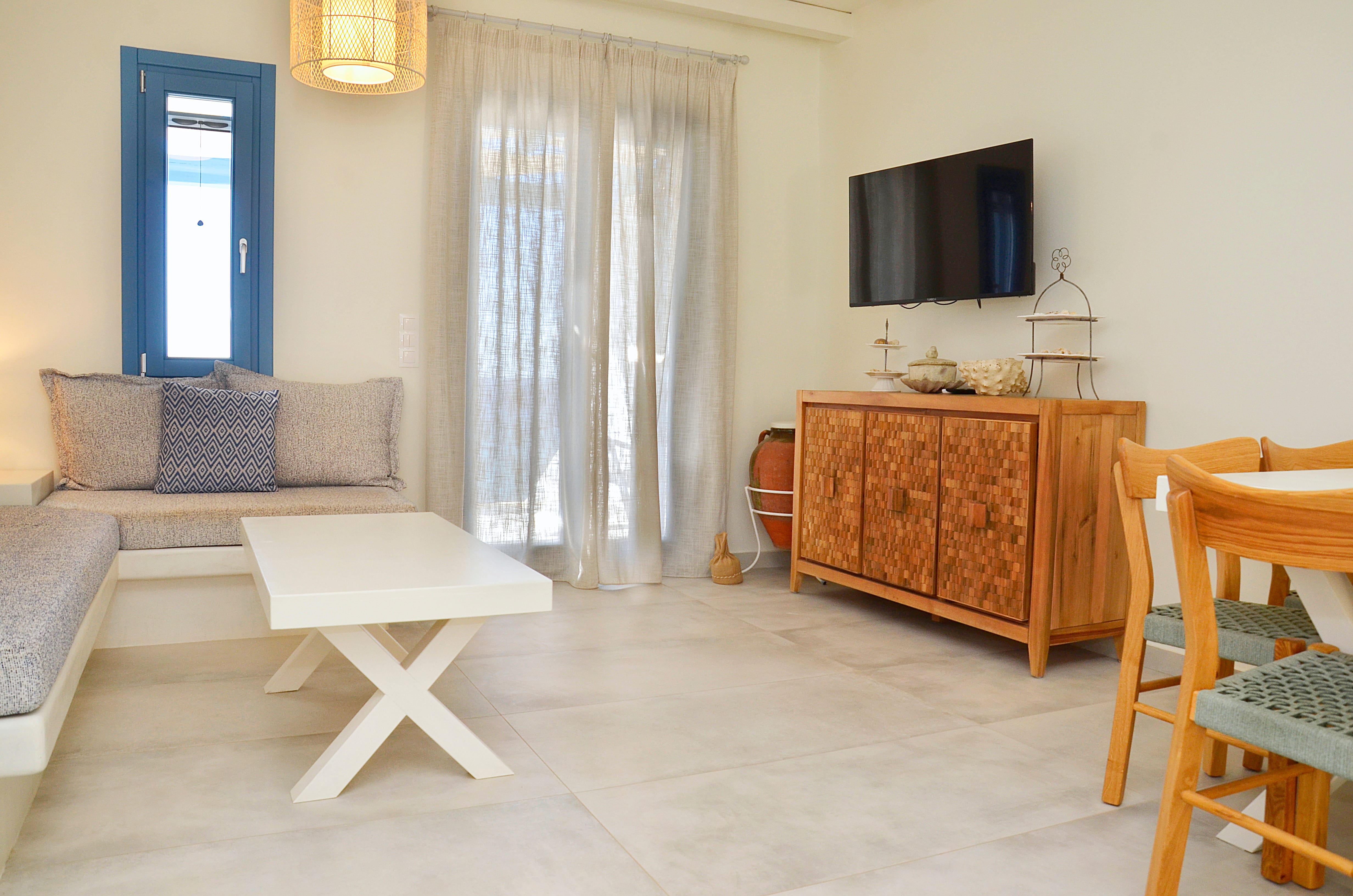 a living room with a couch and a table