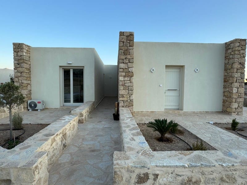 a building with a stone patio