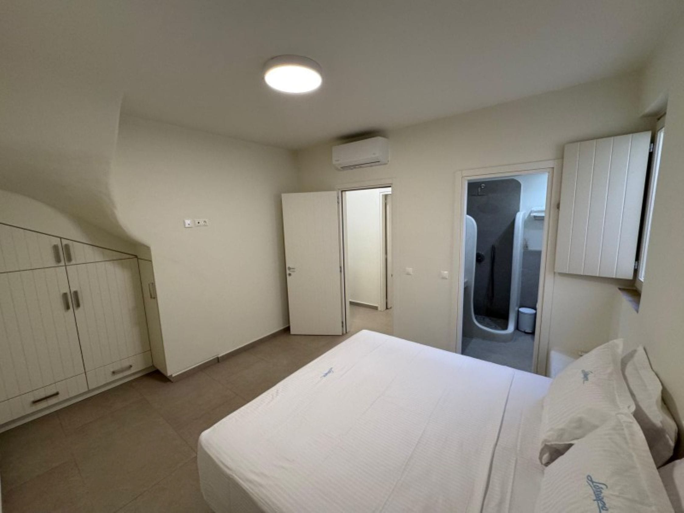 a room with a bed and a couch