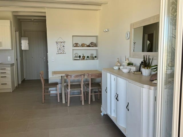 a kitchen with a dining table
