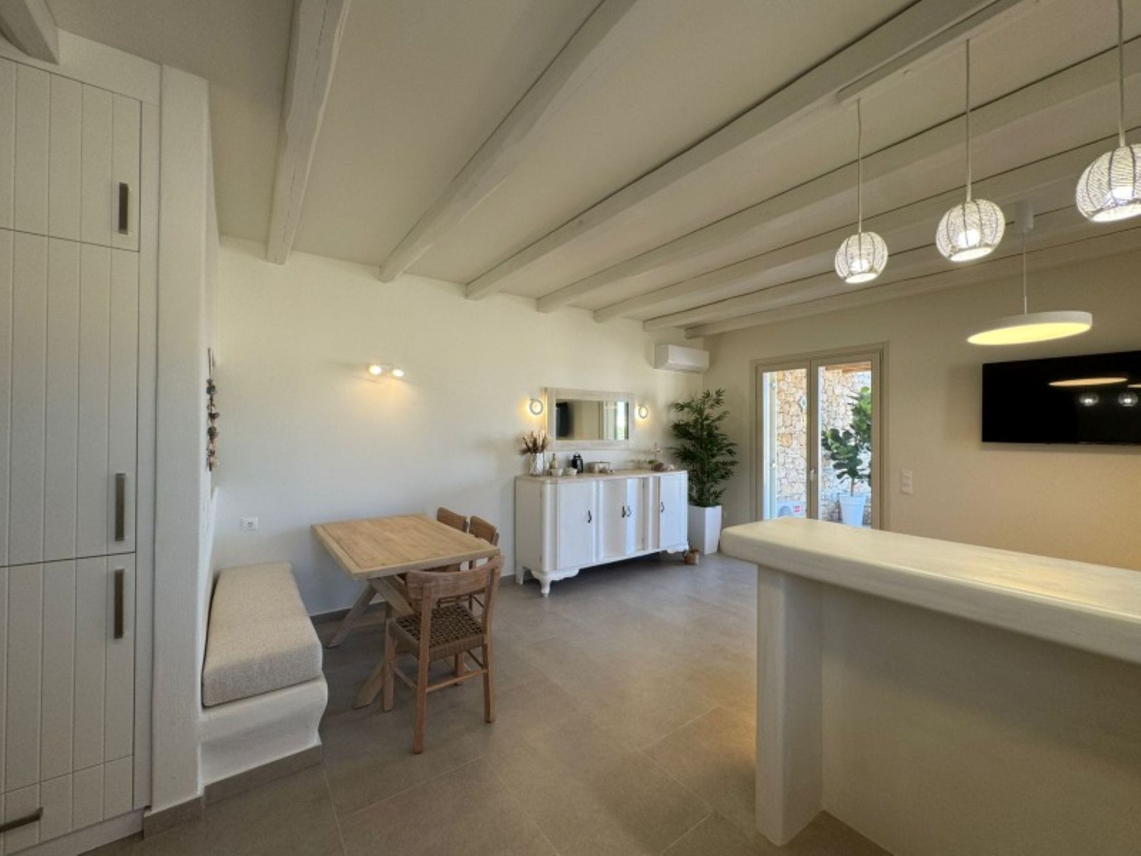 a room with a table and chairs