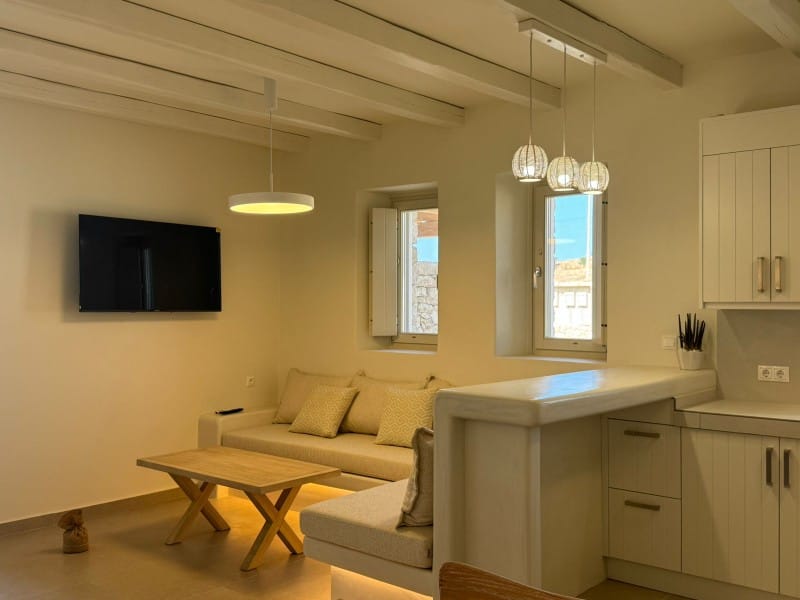 a living room with a tv and a couch