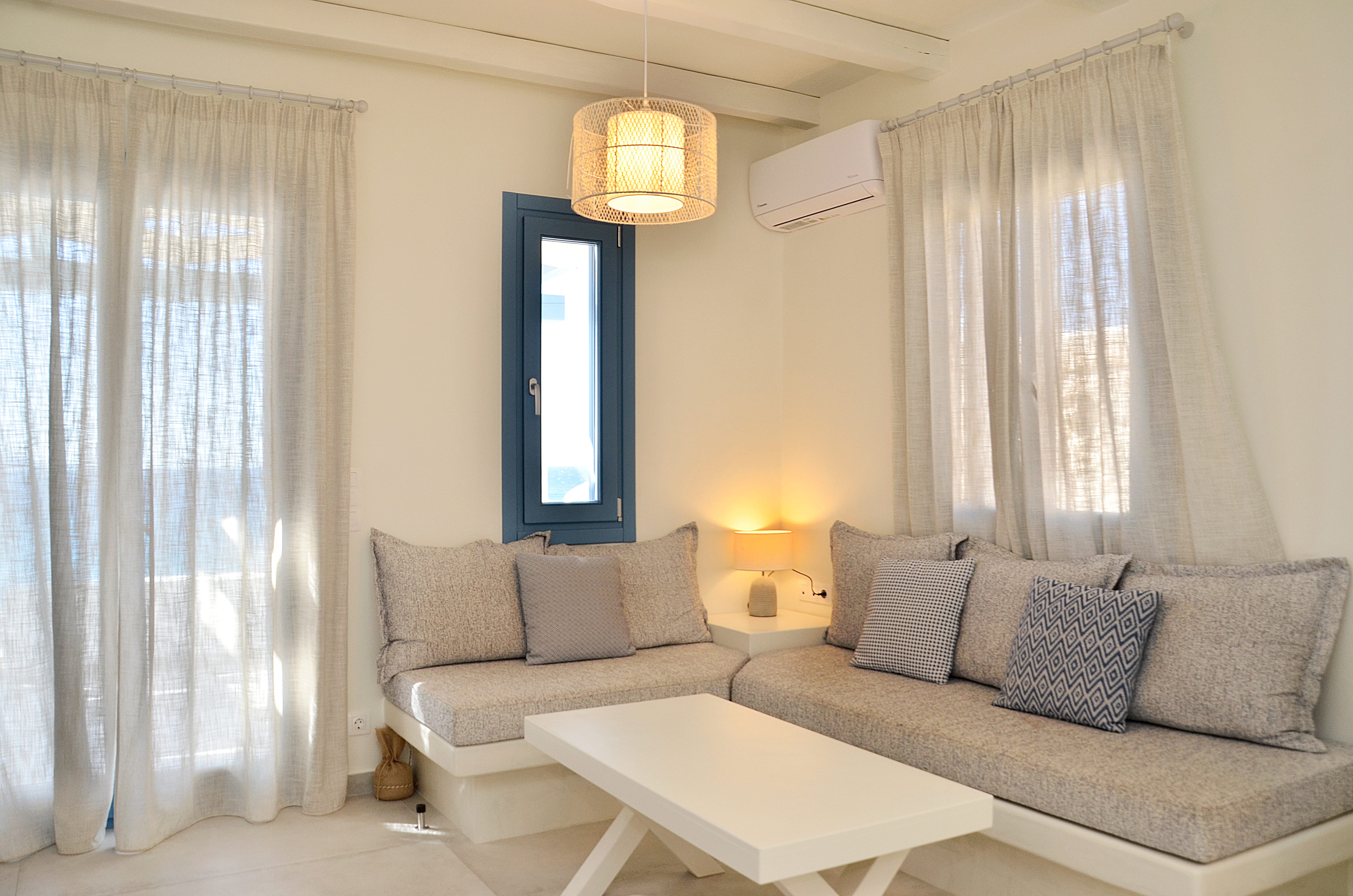 a living room with a couch and a table