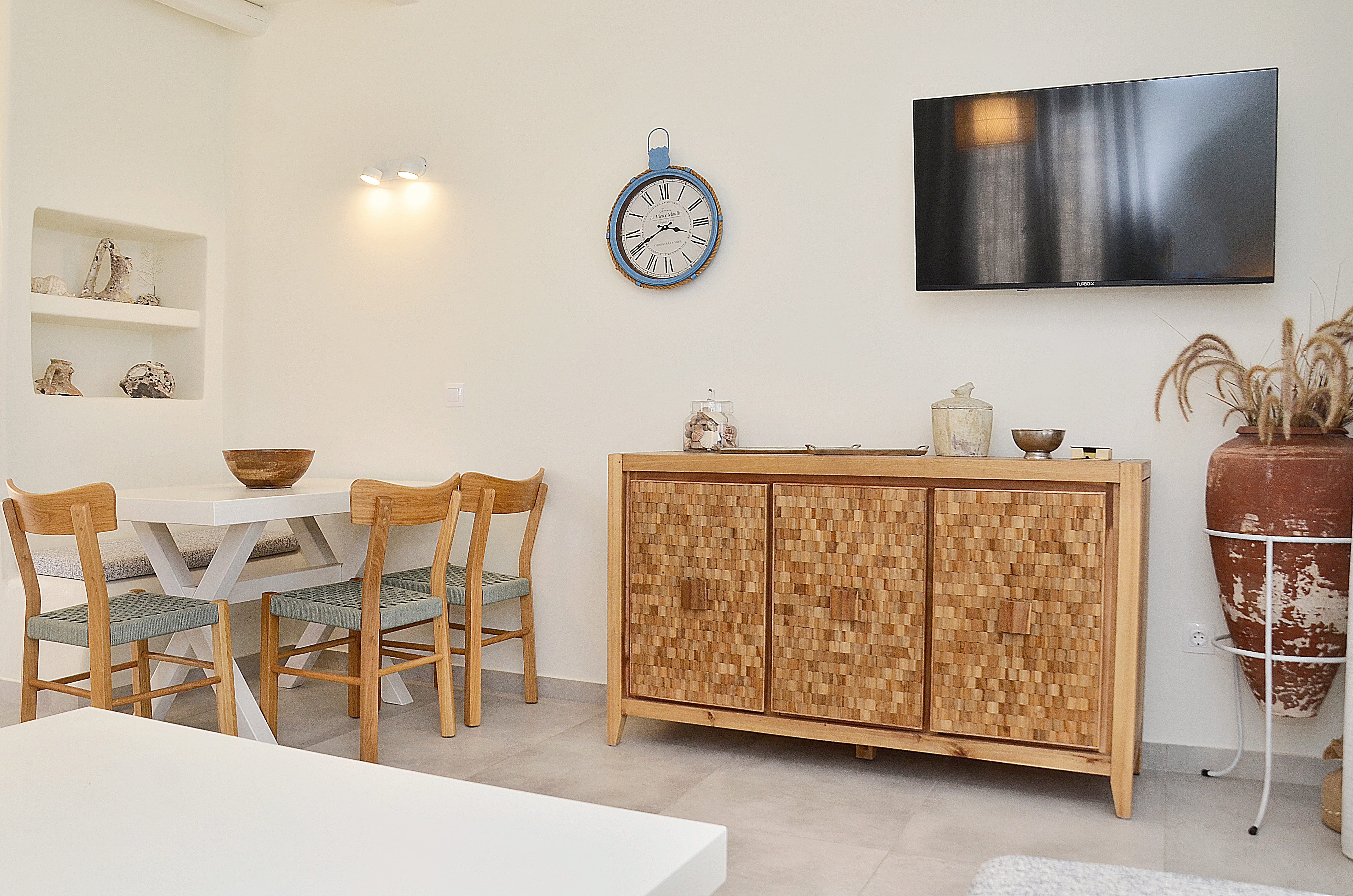 a room with a table and chairs