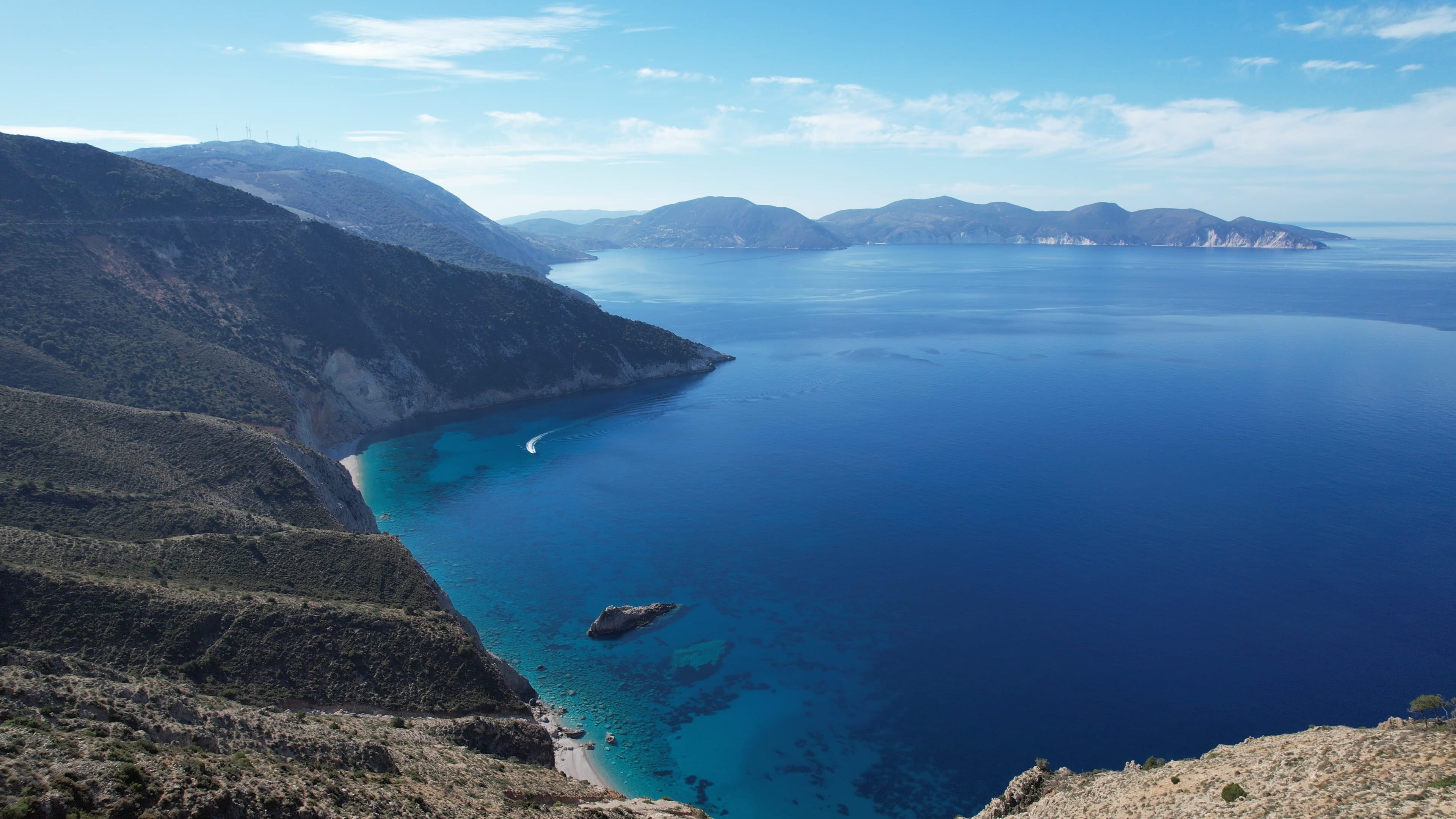 a body of water surrounded by mountains