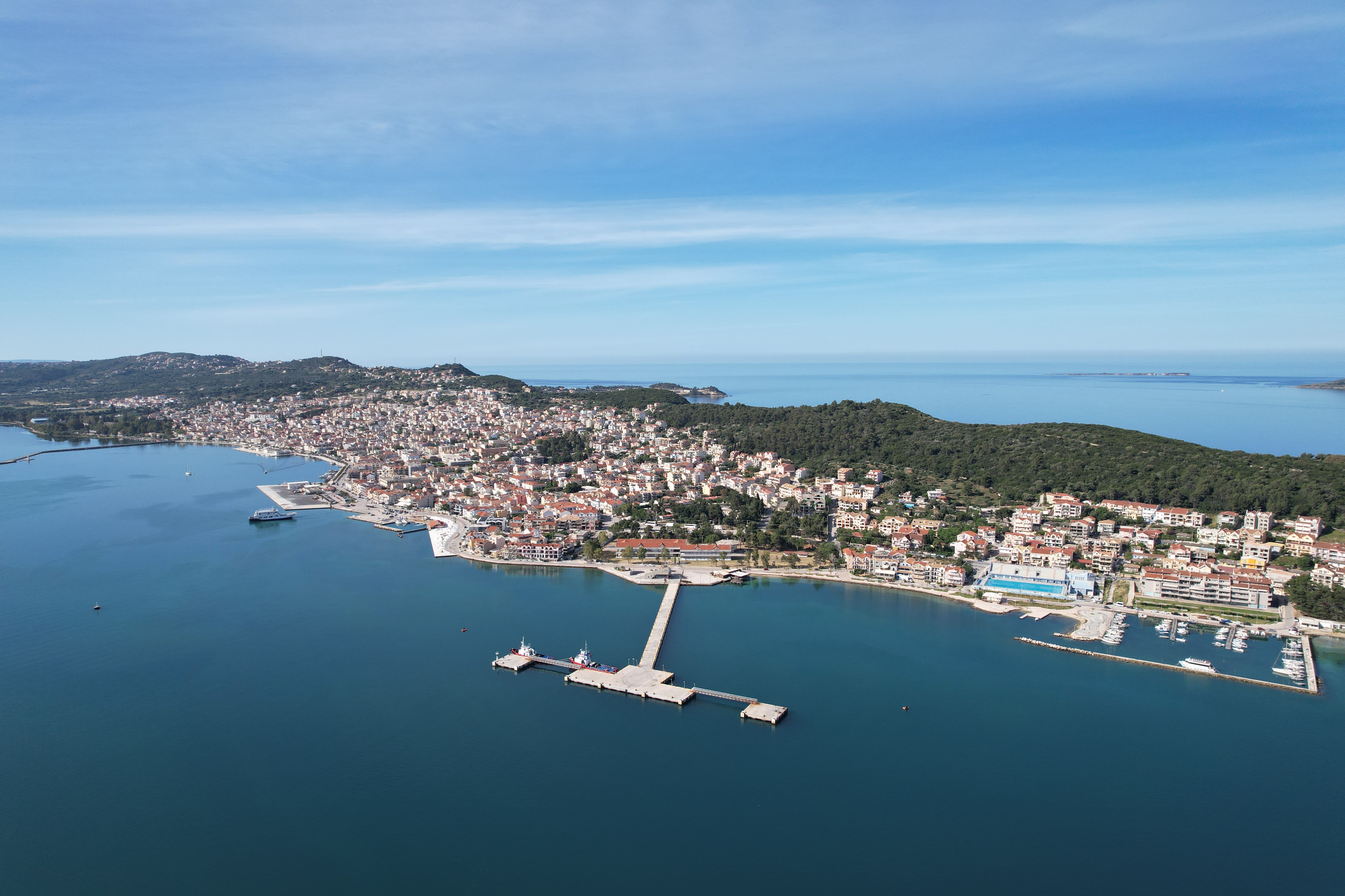 an airplane flying over a city