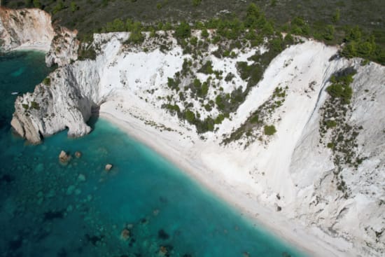 a blue river with ice and snow