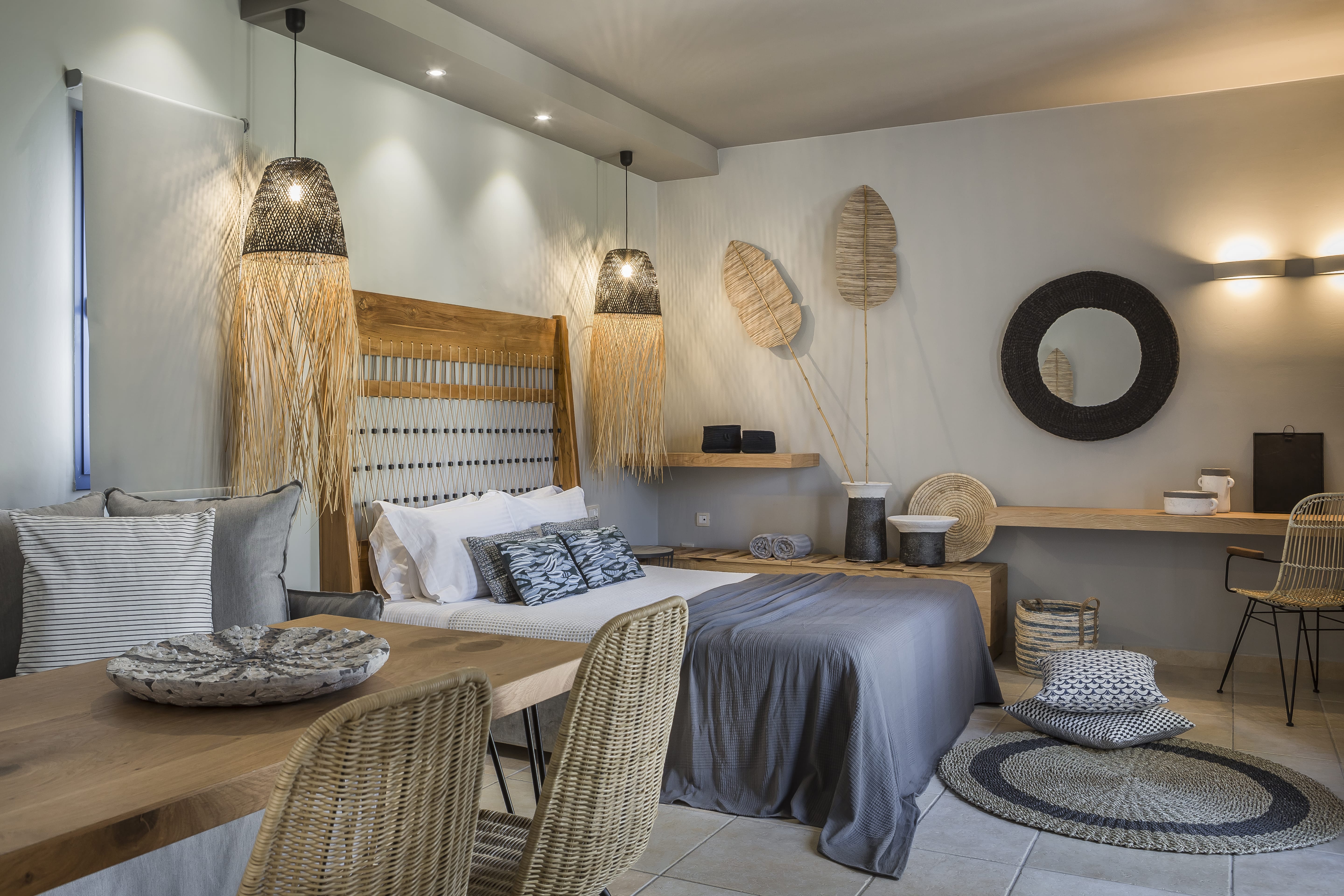 a bedroom with a bed and a table