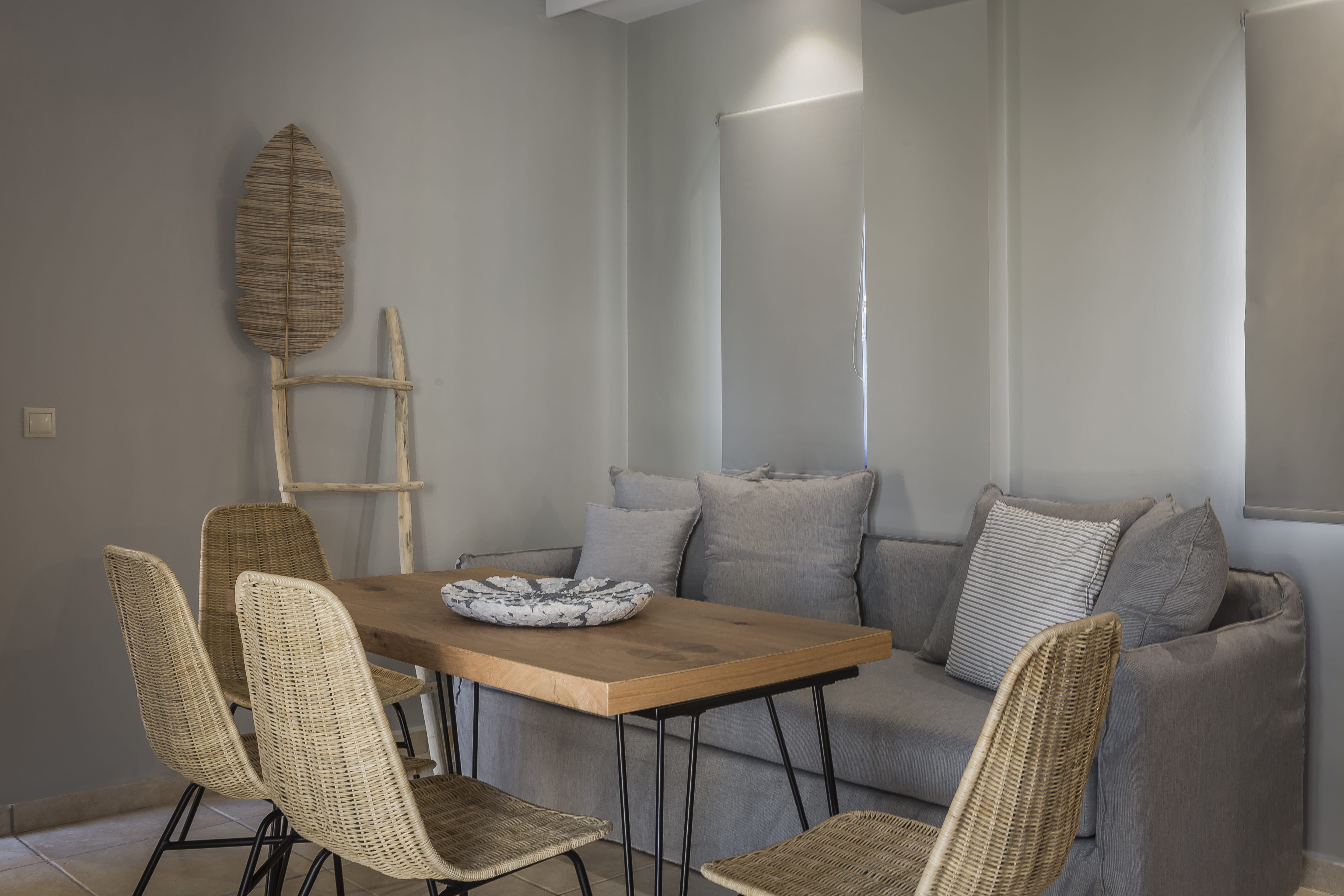 a room with a table and chairs