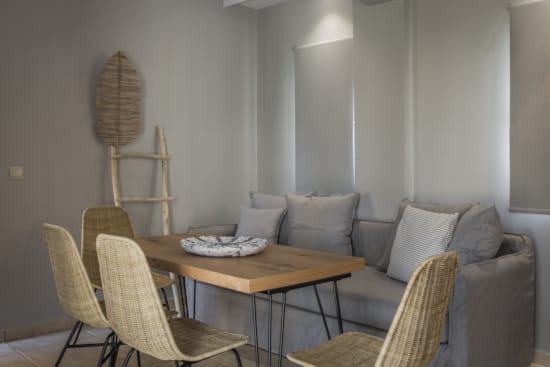 a room with a table and chairs