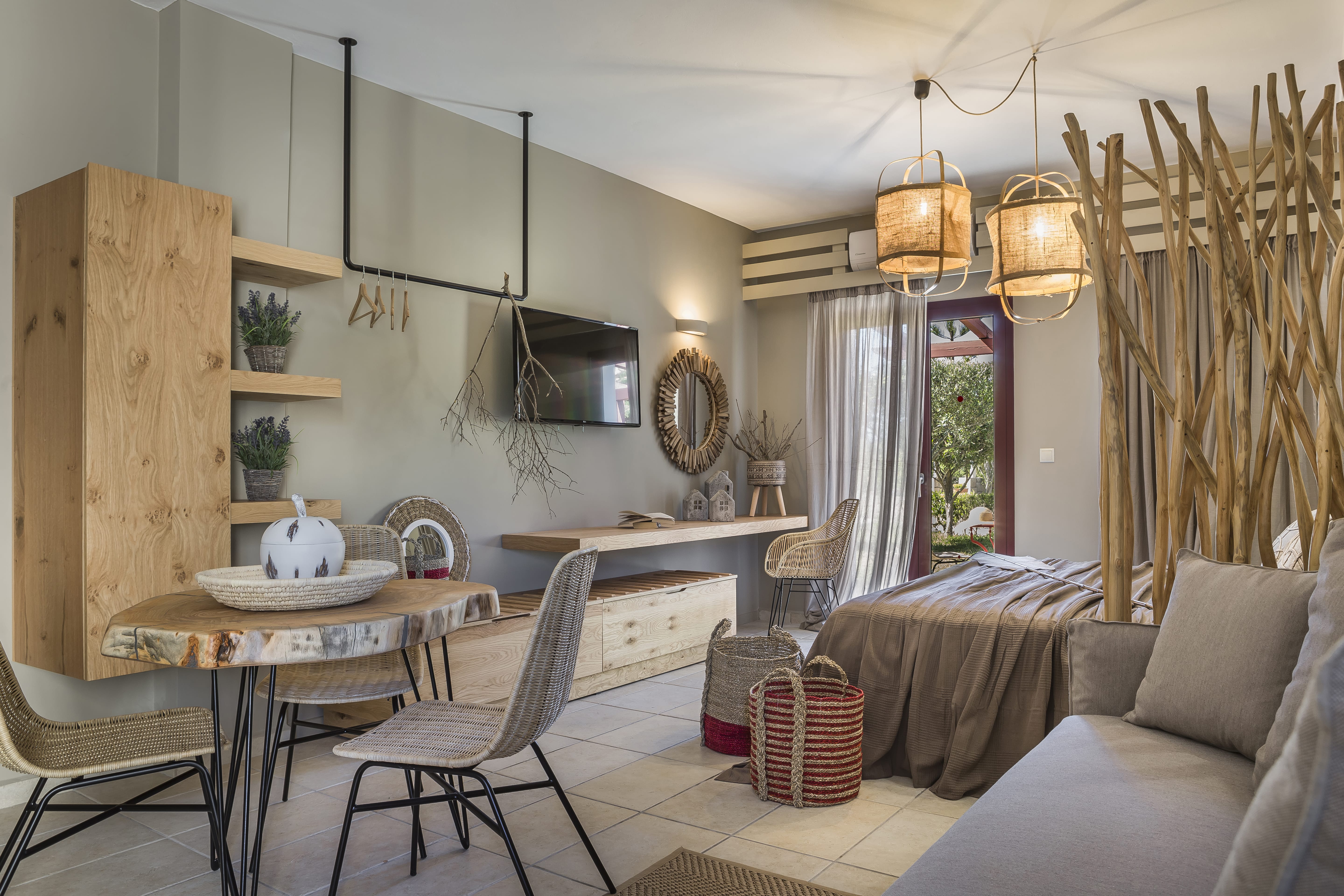 a living room with a table and chairs