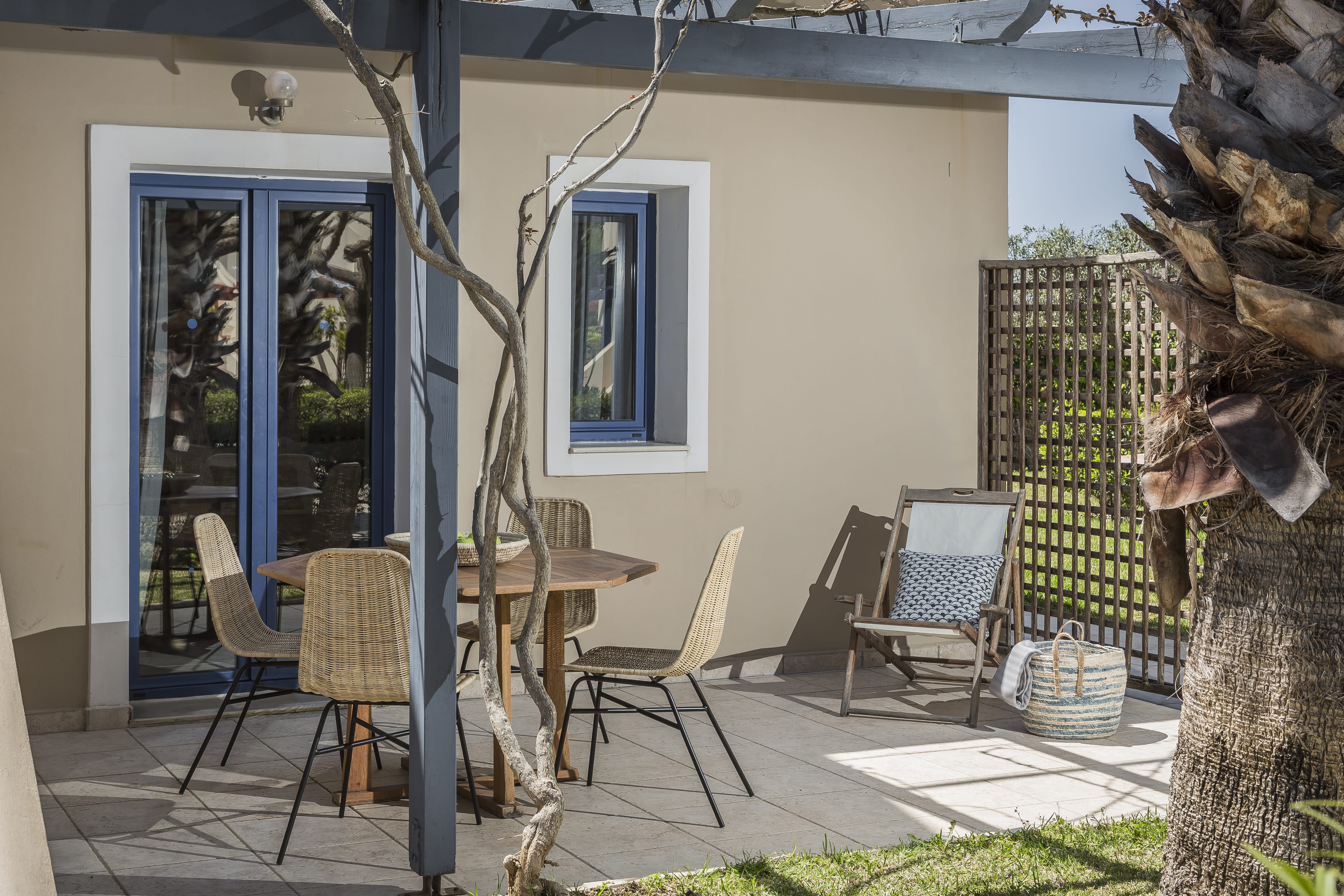 a bird cage on a patio