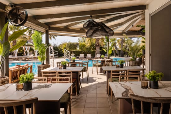 a room with tables and chairs