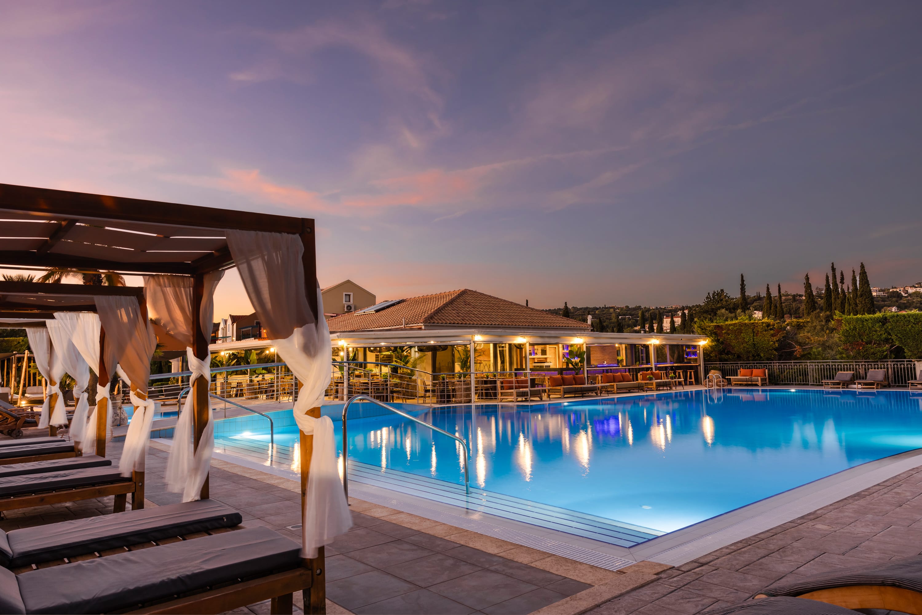 a pool with a building in the background