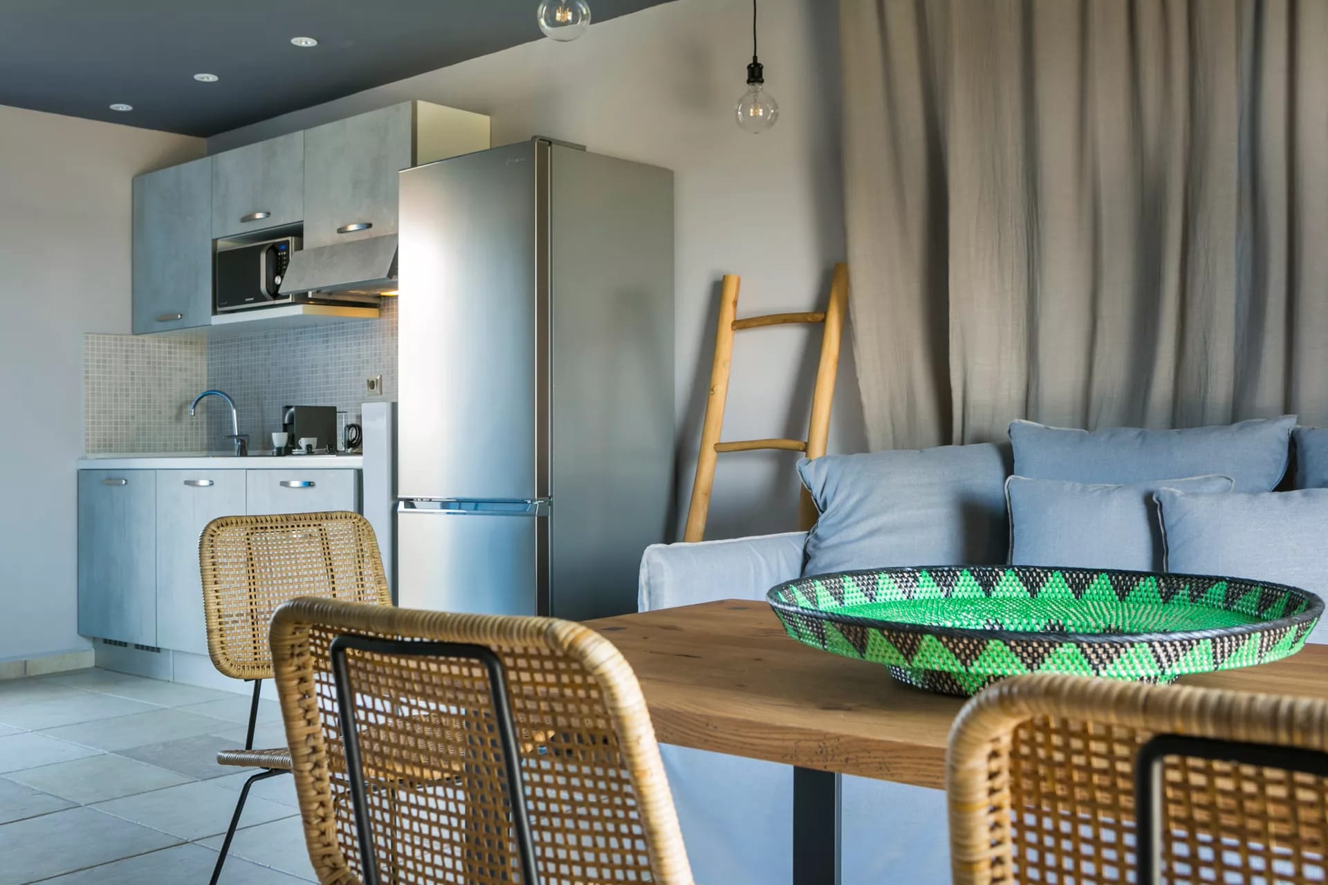 a living room with a couch and a table