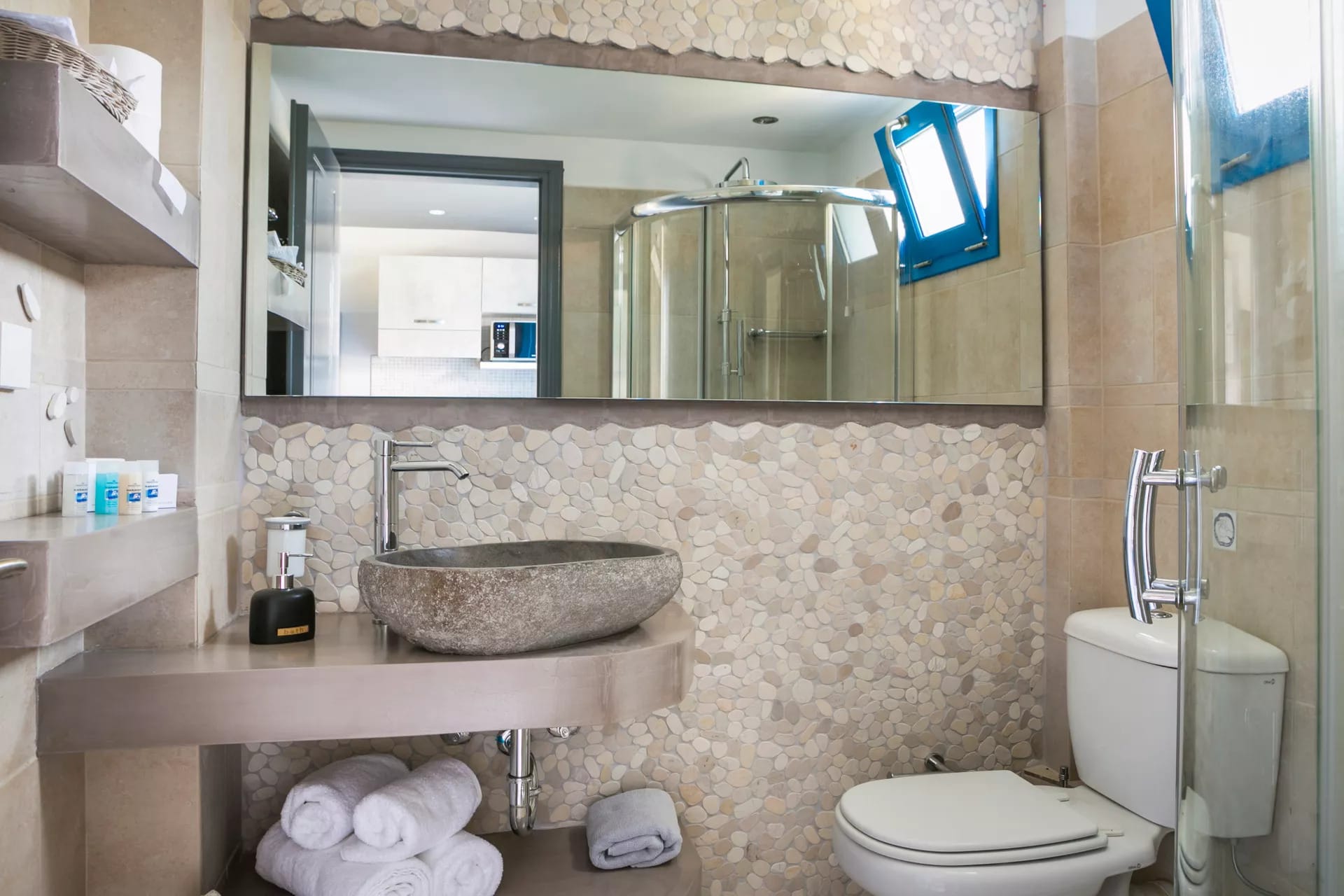 a bathroom with a large mirror