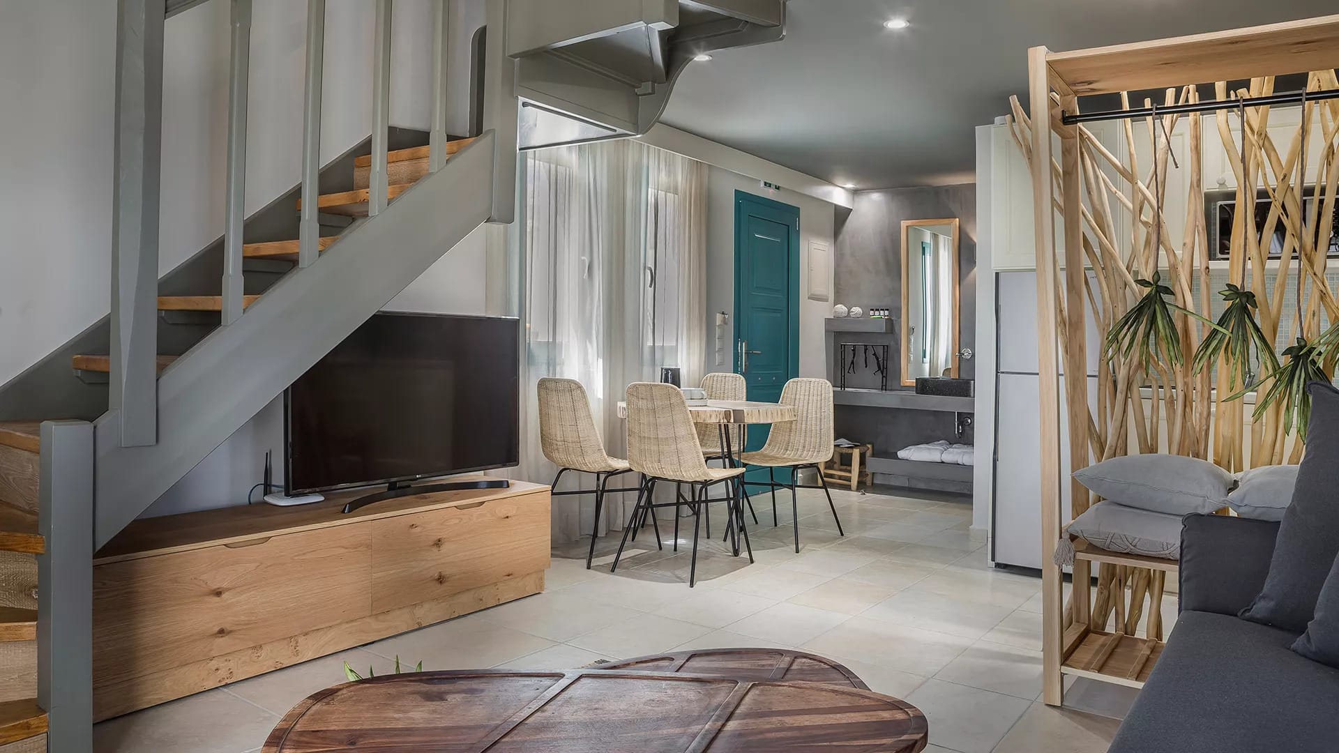 a living room with a staircase