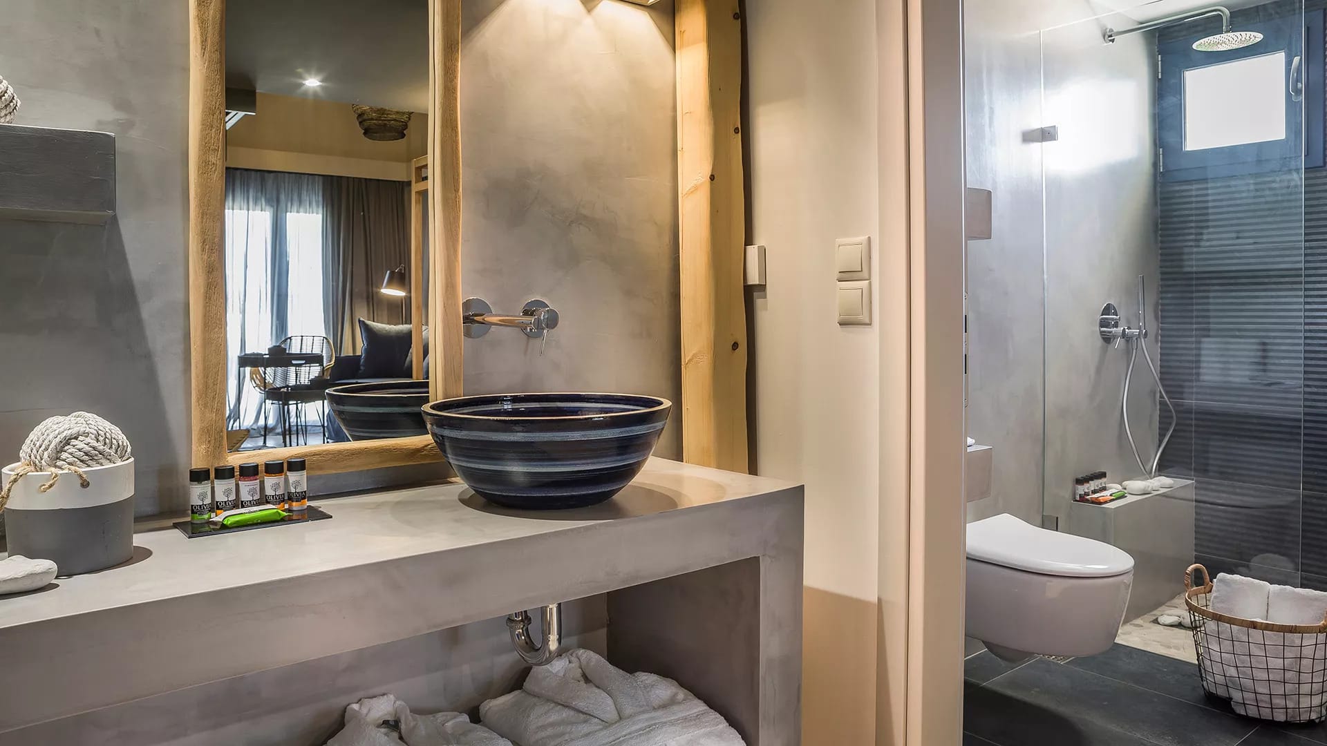 a bathroom with a tub and toilet