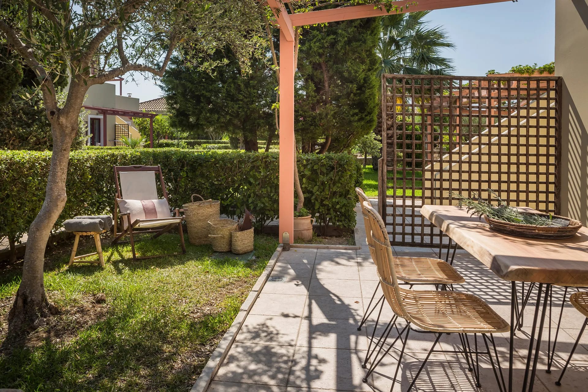 a patio with chairs and tables