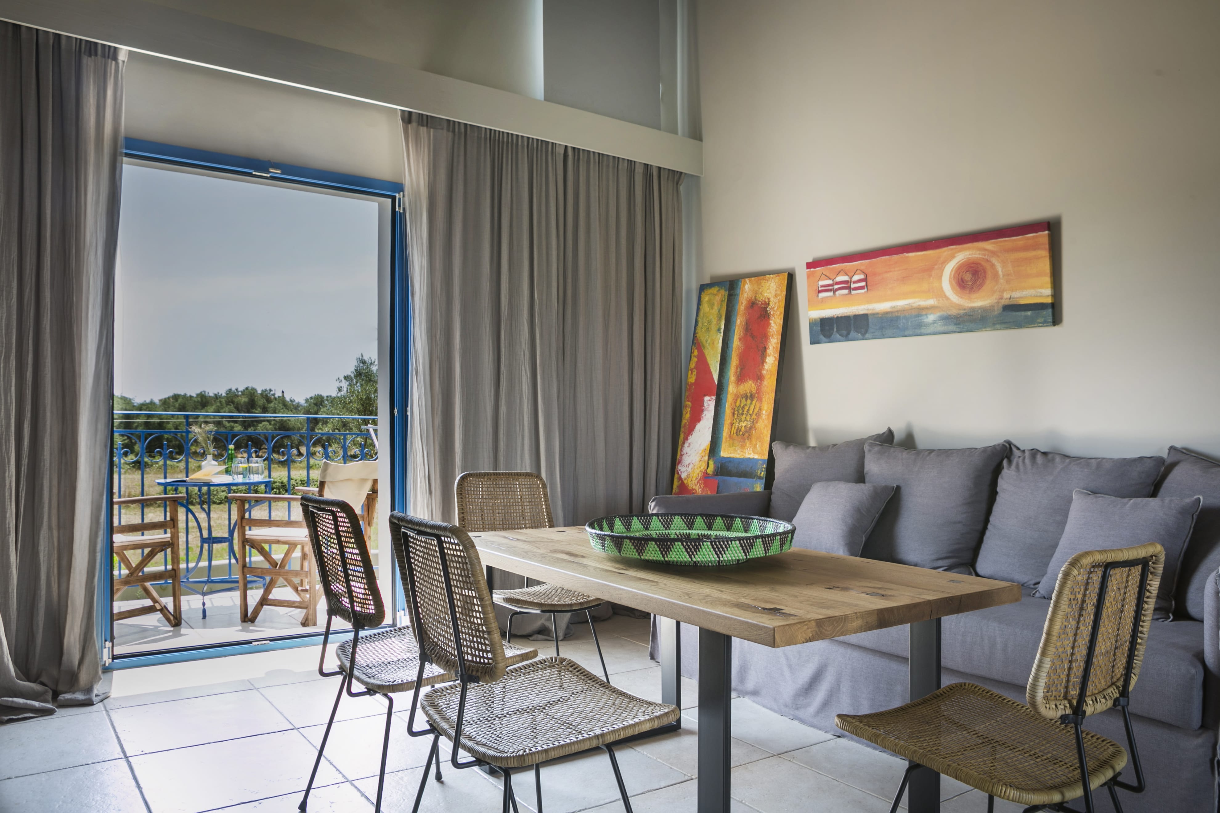 a room with a table and chairs