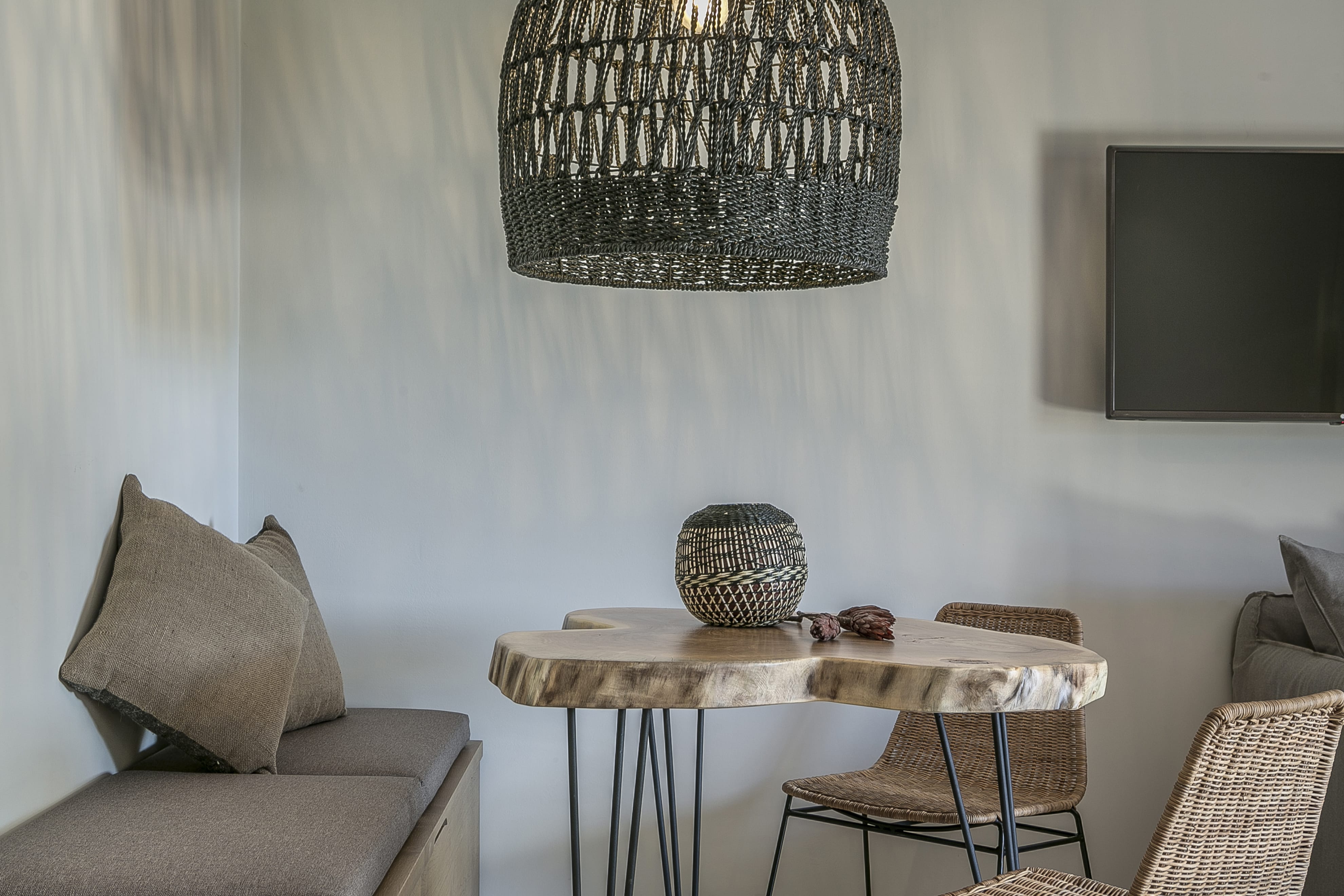 a room with a table and chairs