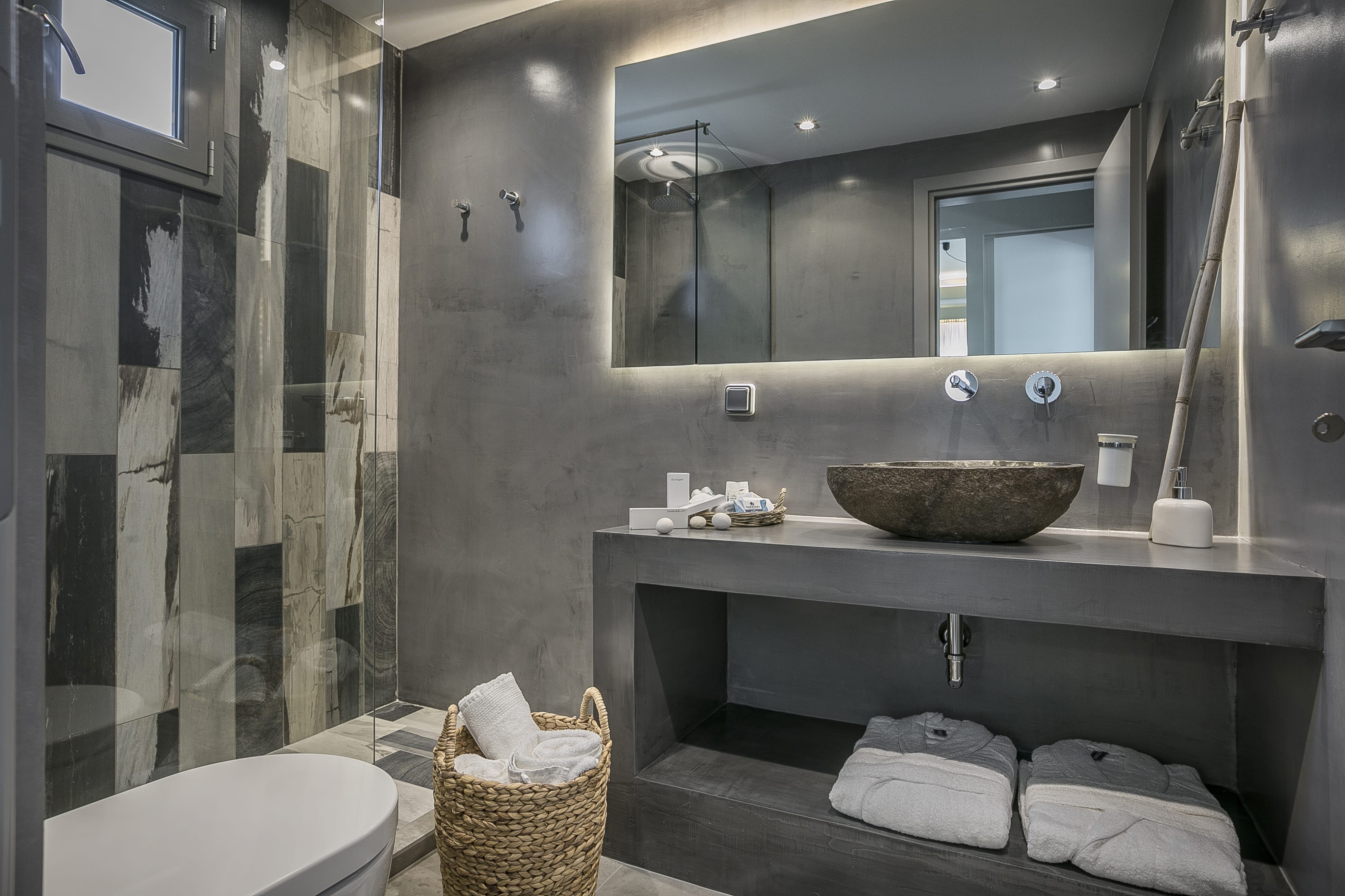 a bathroom with a large mirror