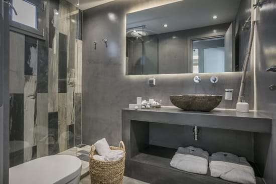 a bathroom with a large mirror