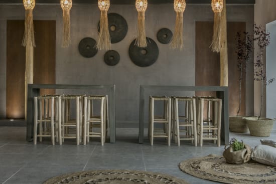 a room with a table and chairs