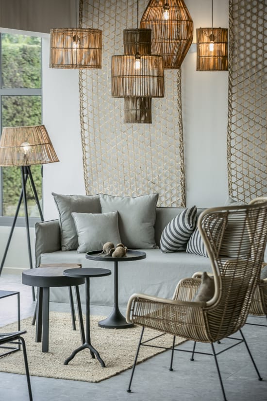 a couch with a table and chairs