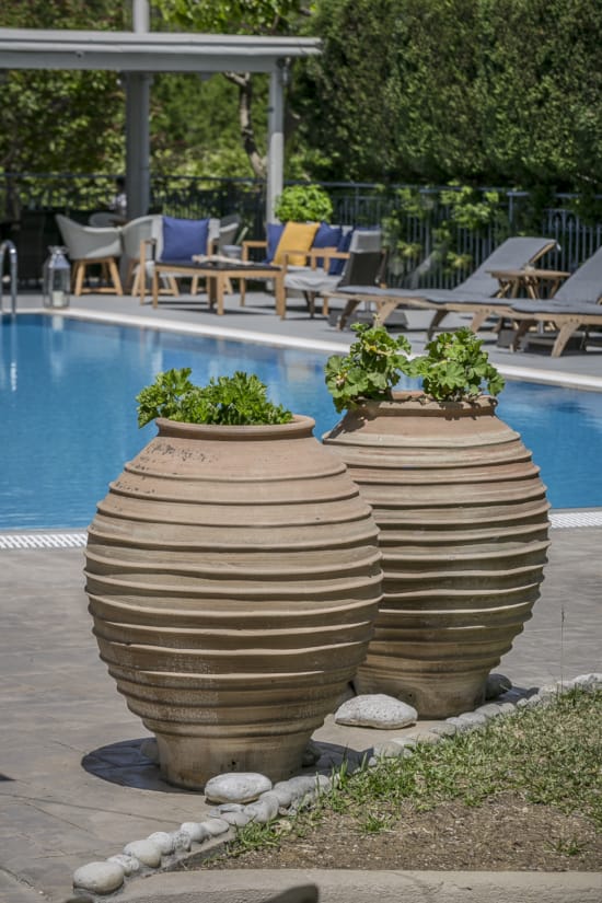 a large water fountain in a backyard