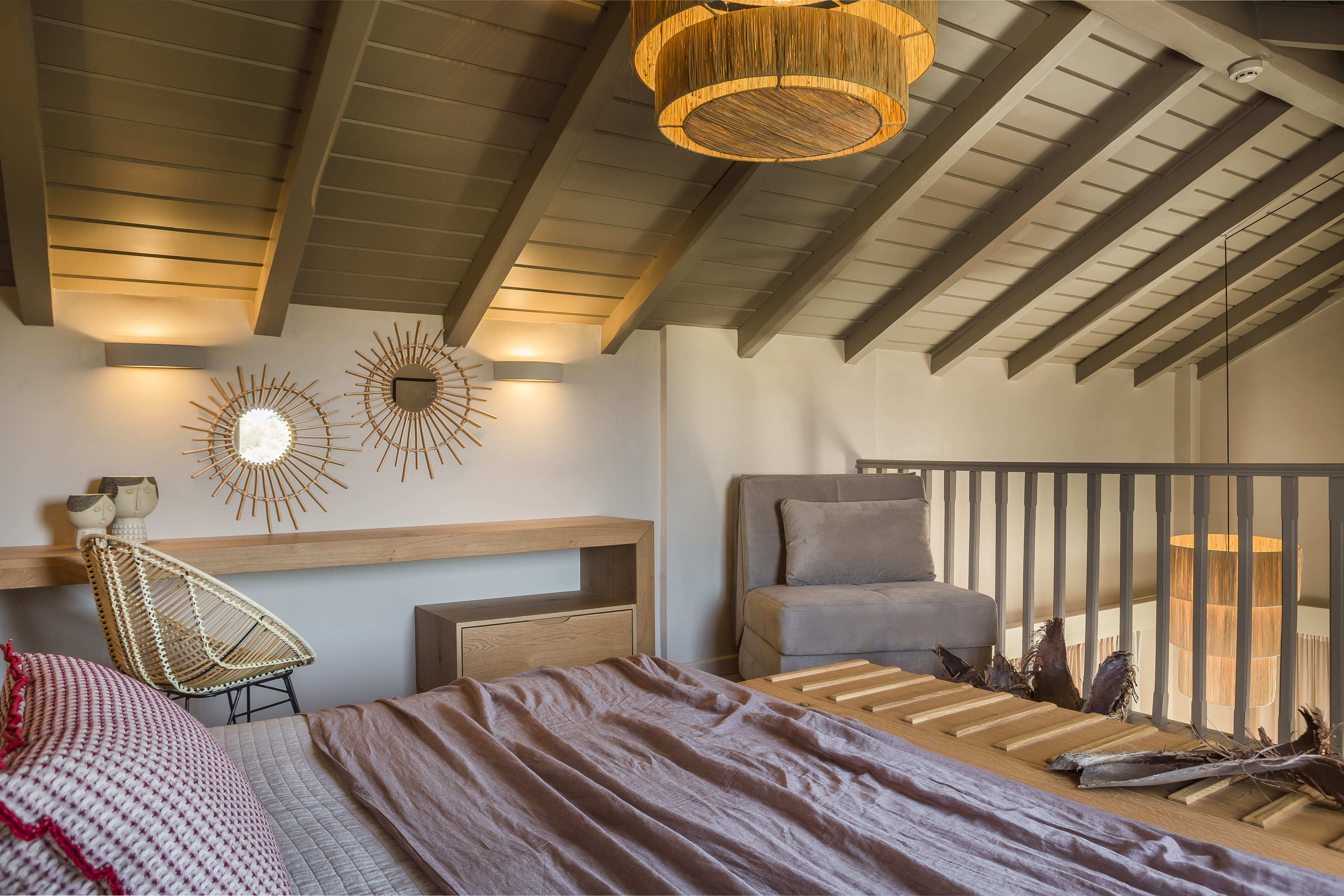 a room with a bed and a chair