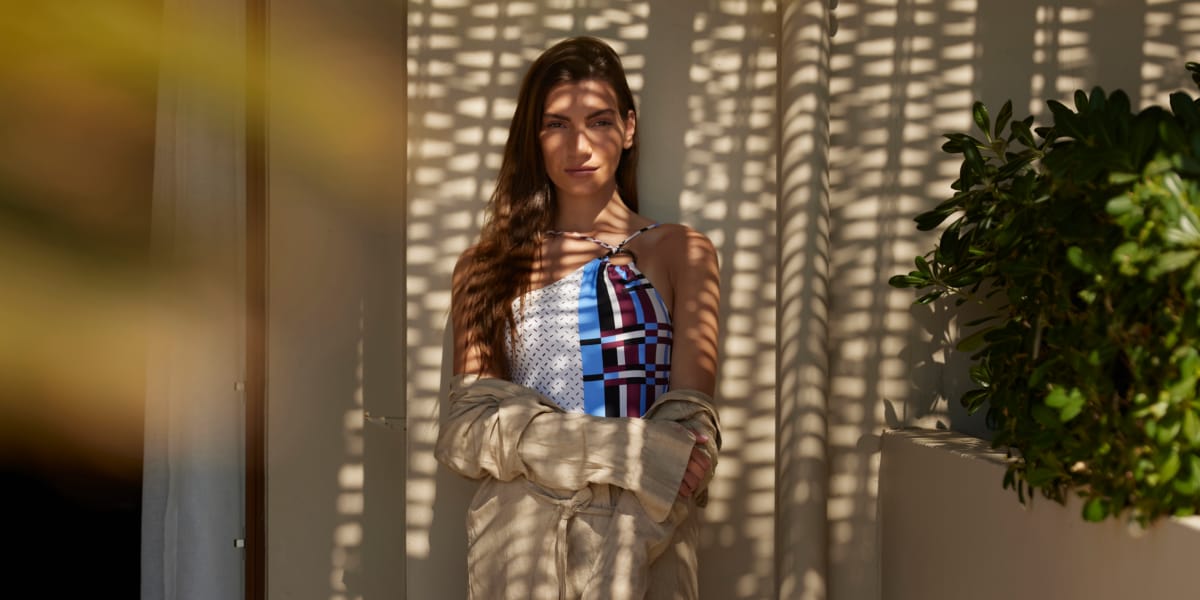 a person standing in front of a window