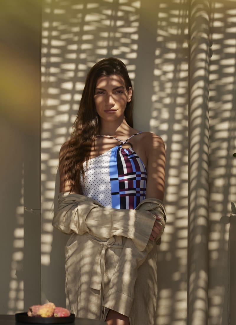 a person standing in front of a window