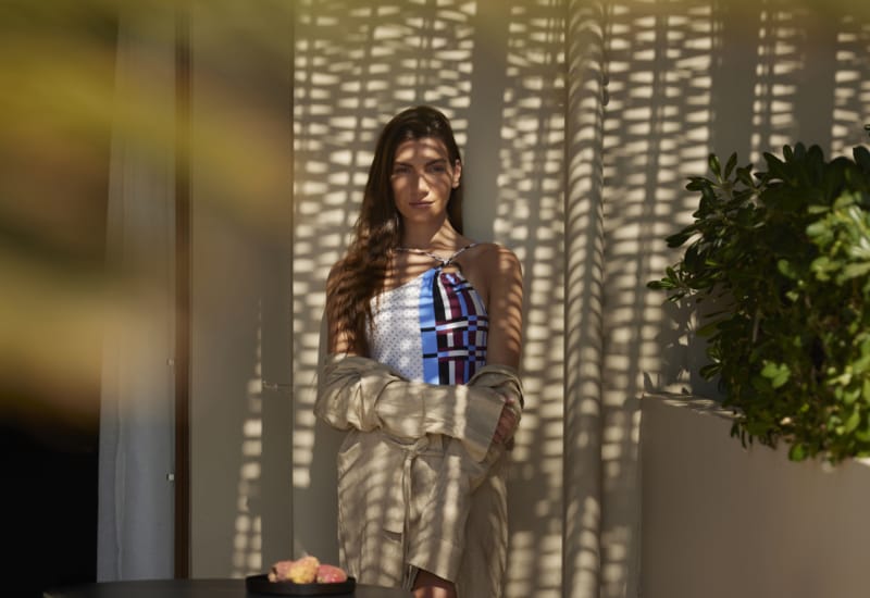 a person standing in front of a window