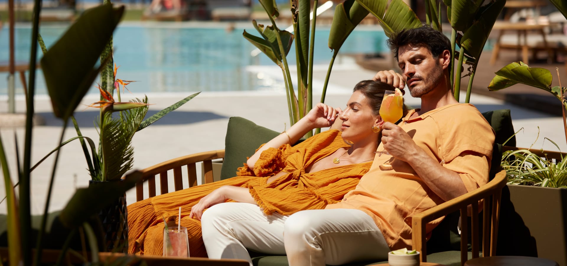 a couple of men sitting in chairs