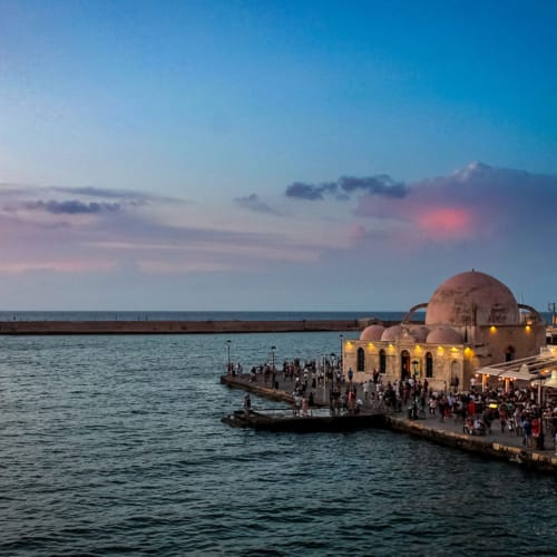 a body of water with buildings along it