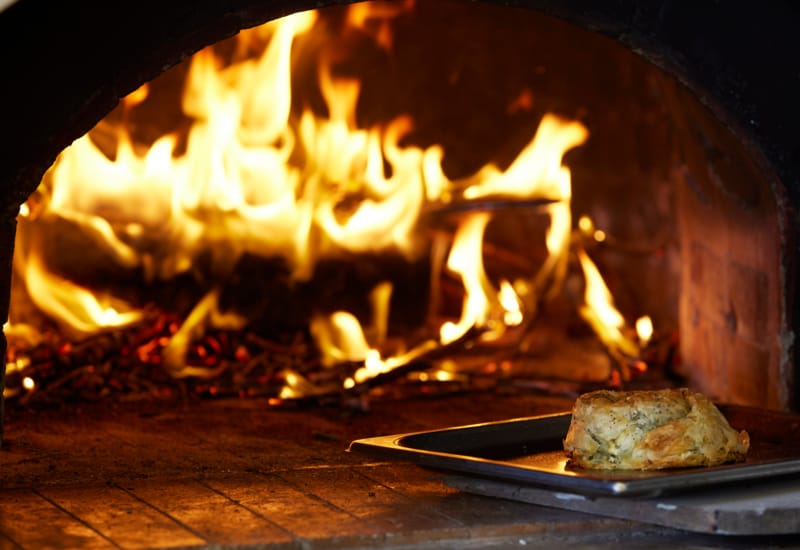 a fire burning in a fireplace