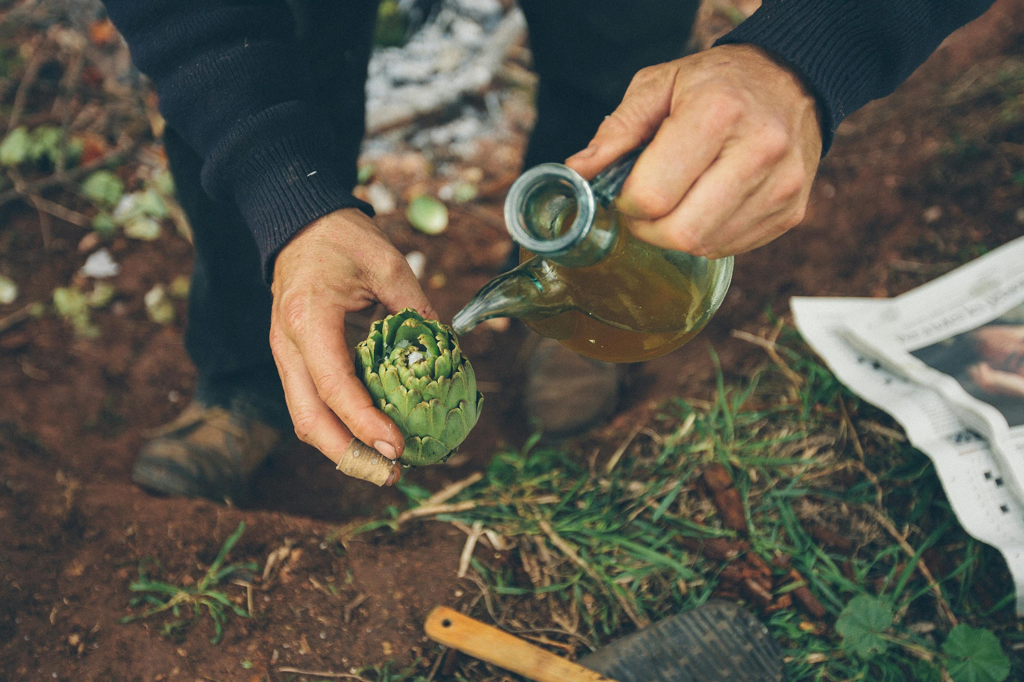 a person holding a bottle of water