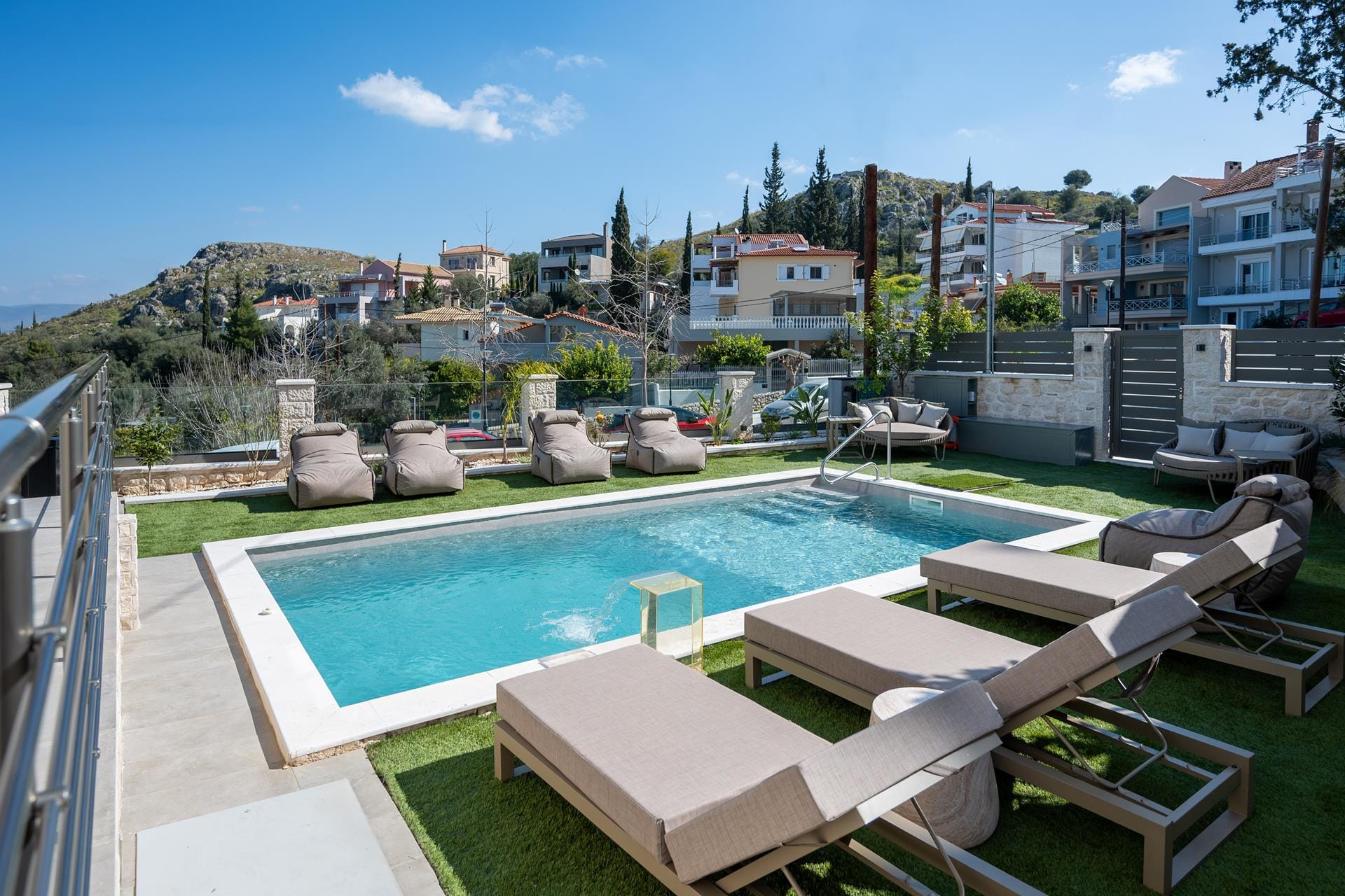 a pool with chairs around it