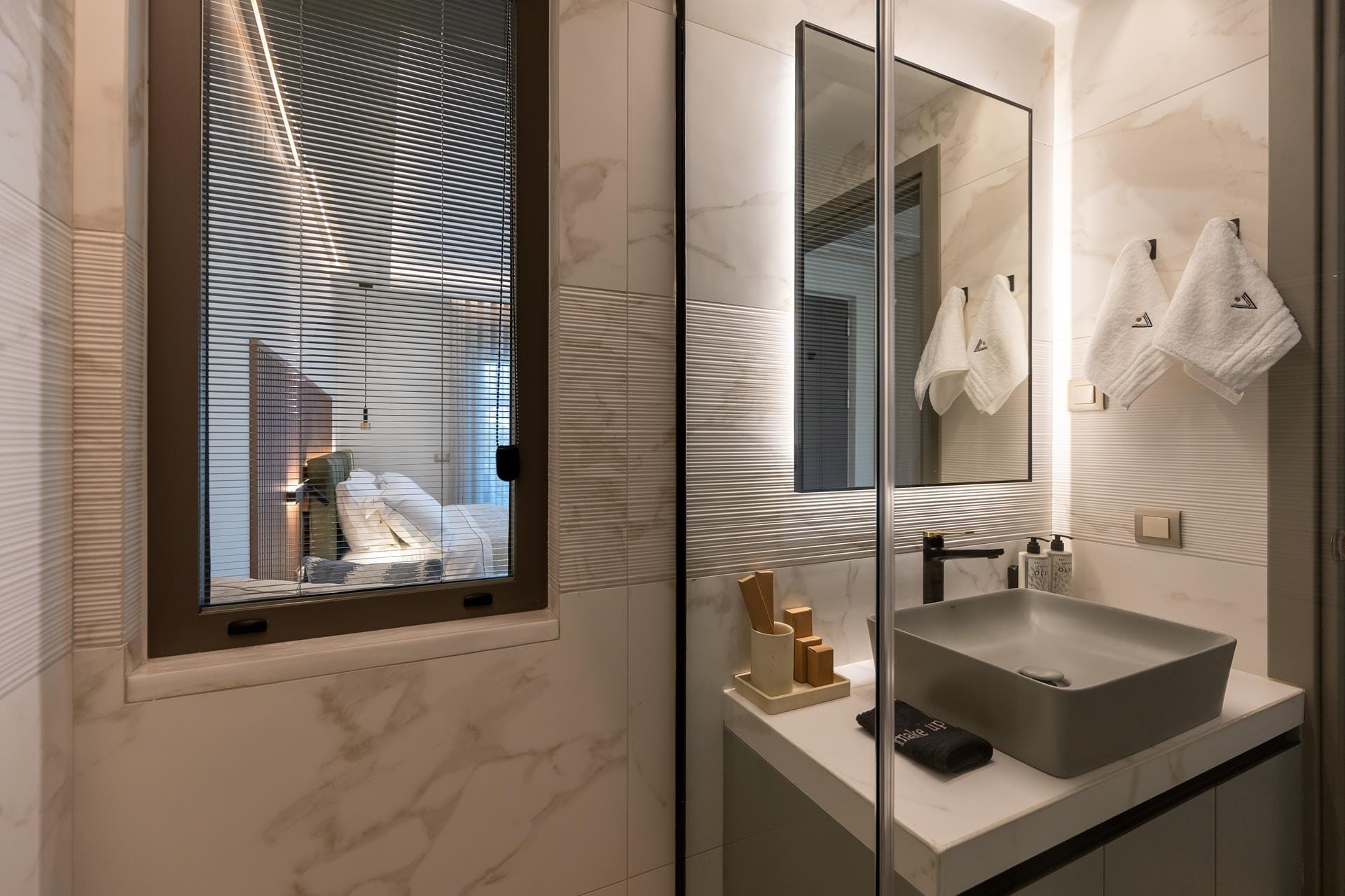 a bathroom with a large mirror