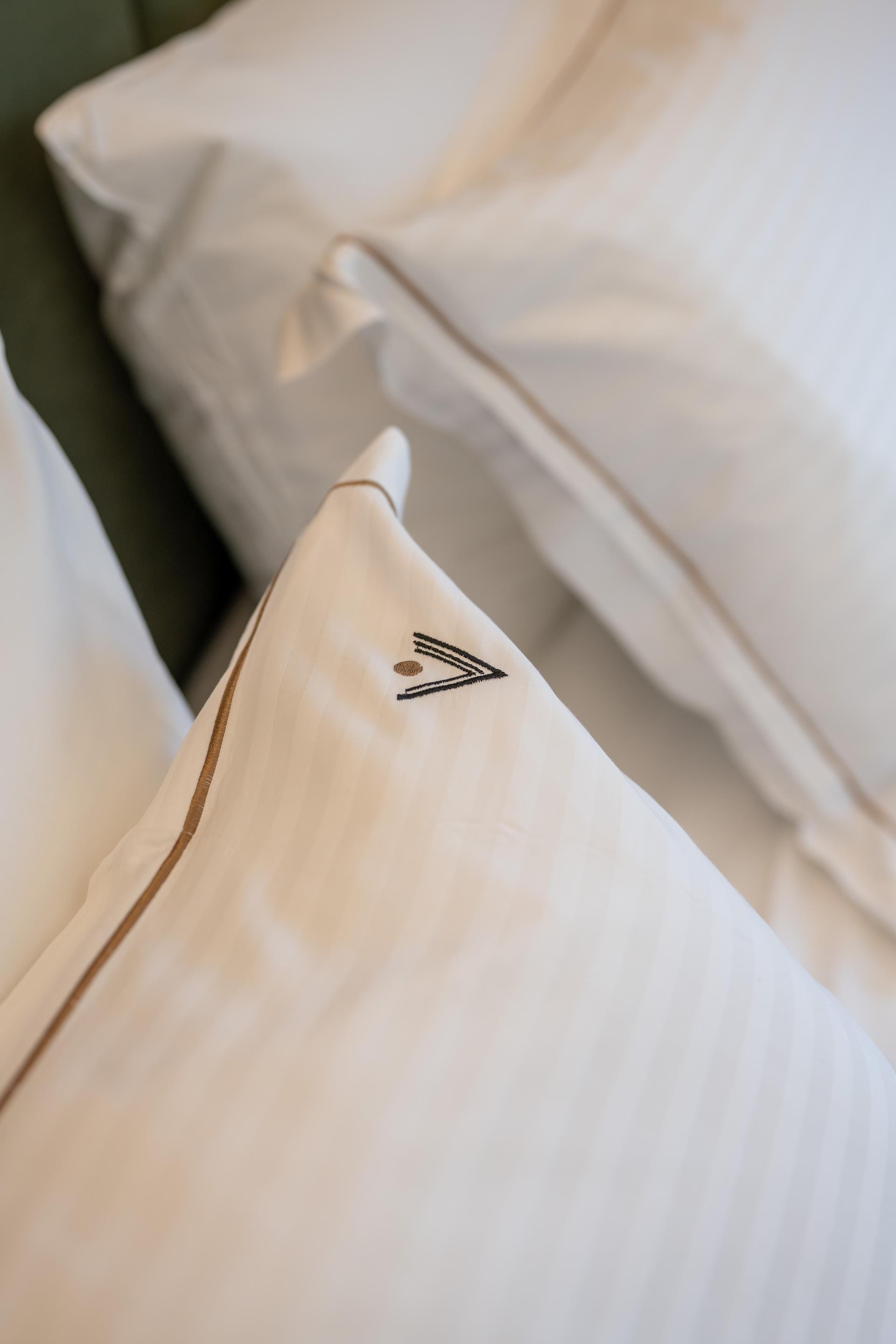 a white shirt with a black logo