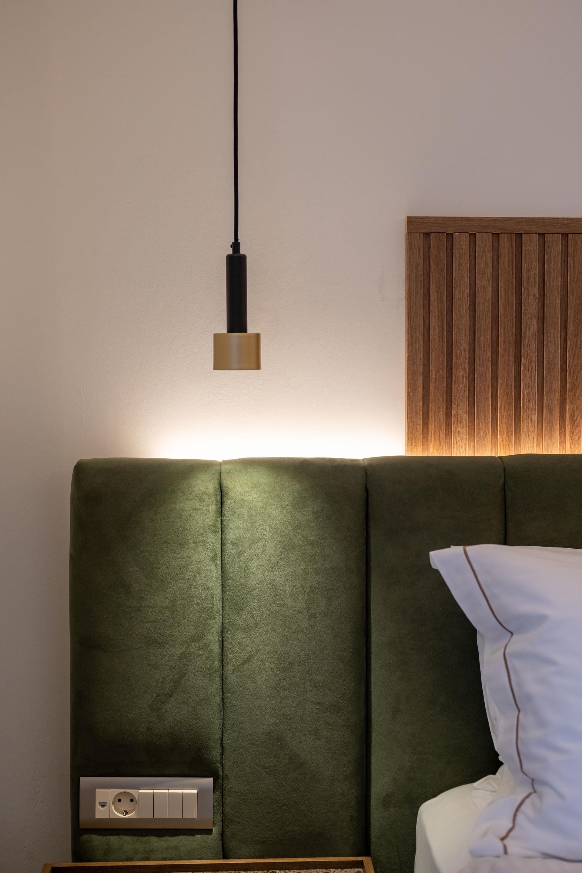 a green lamp on a green couch