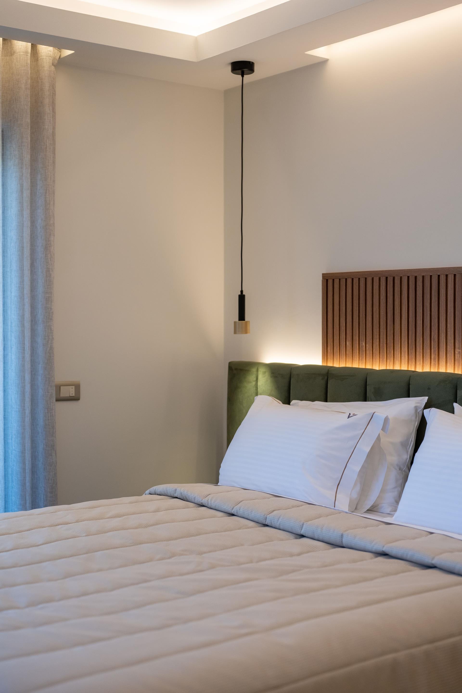 a hotel room with two beds