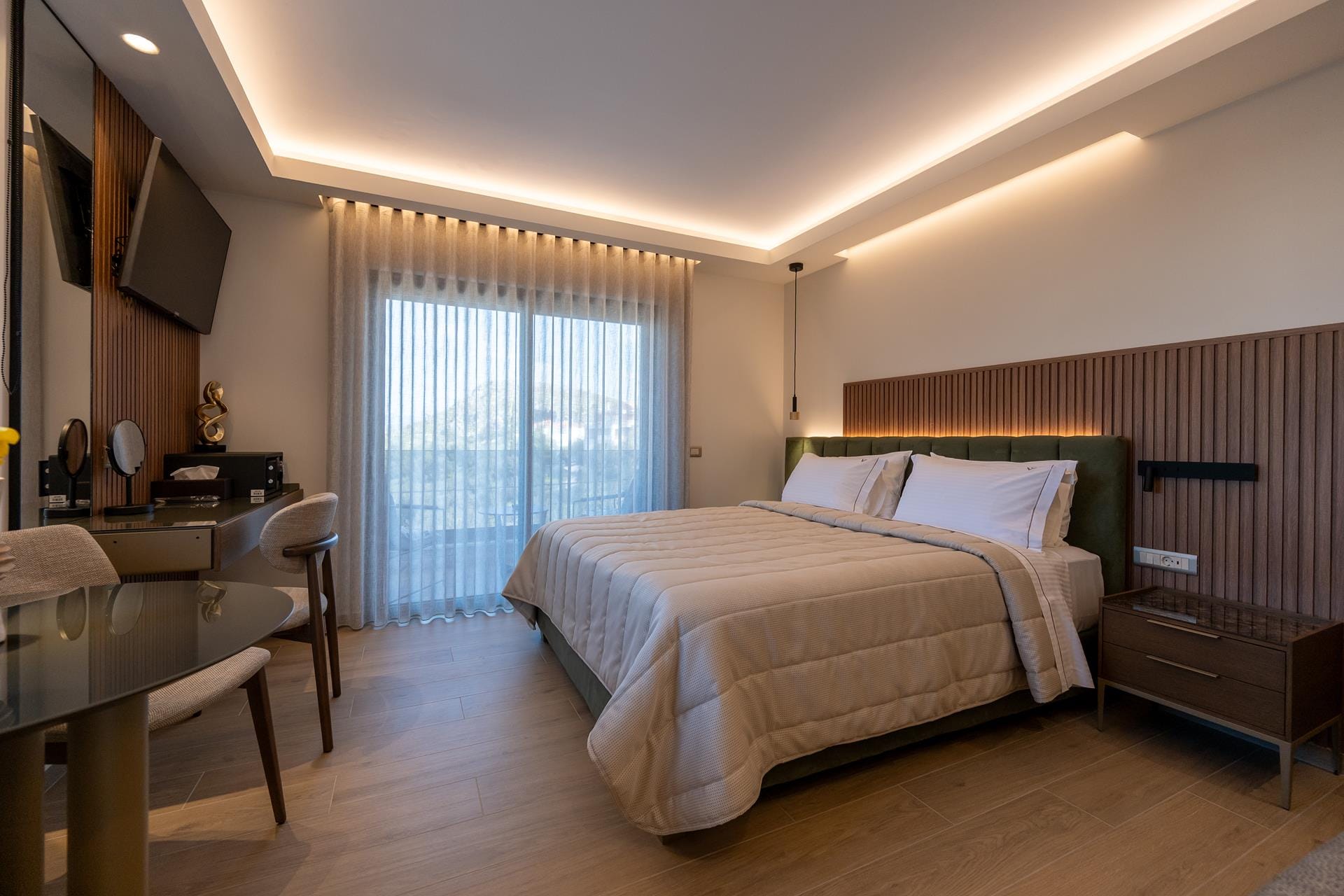 a bedroom with a bed and desk