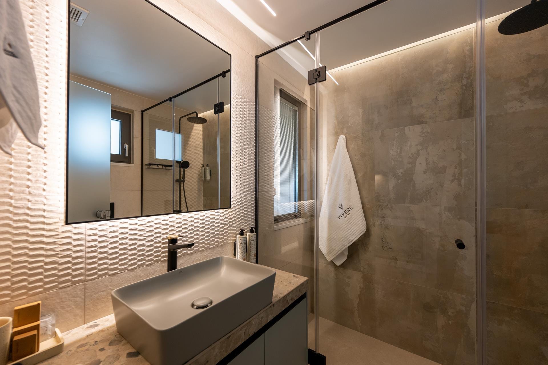 a bathroom with a large mirror
