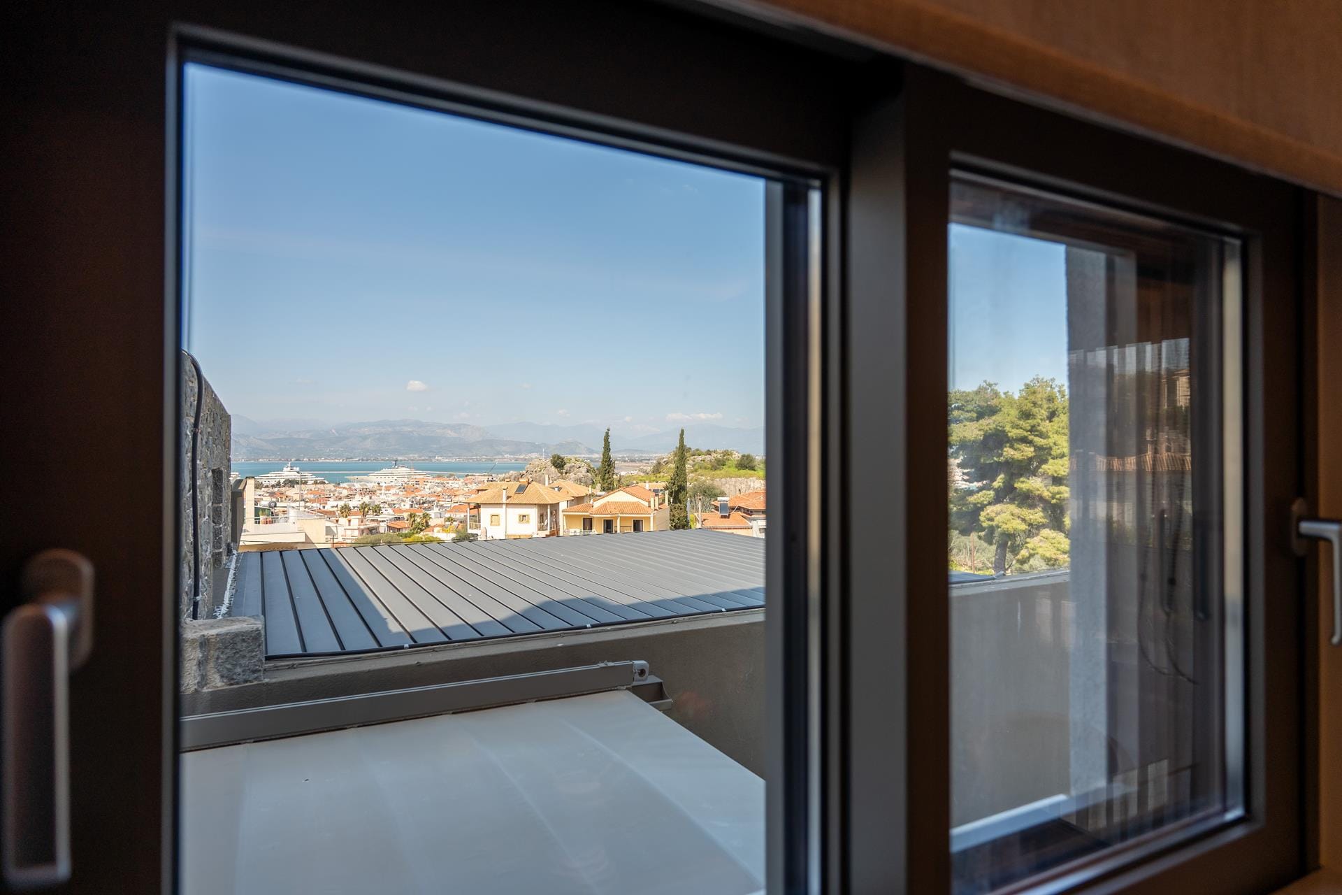 a window with a view of a city