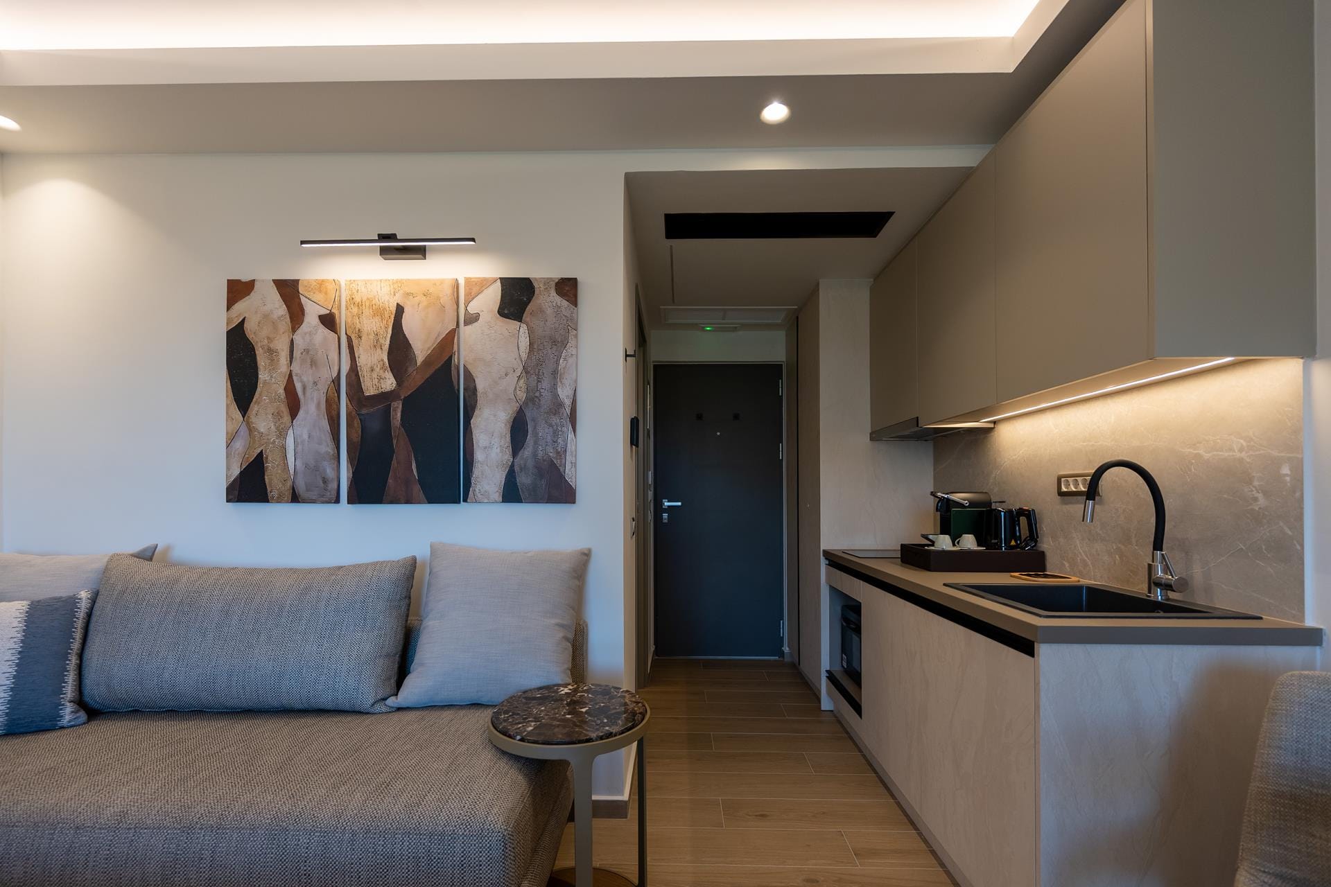 a living room with a couch and a table