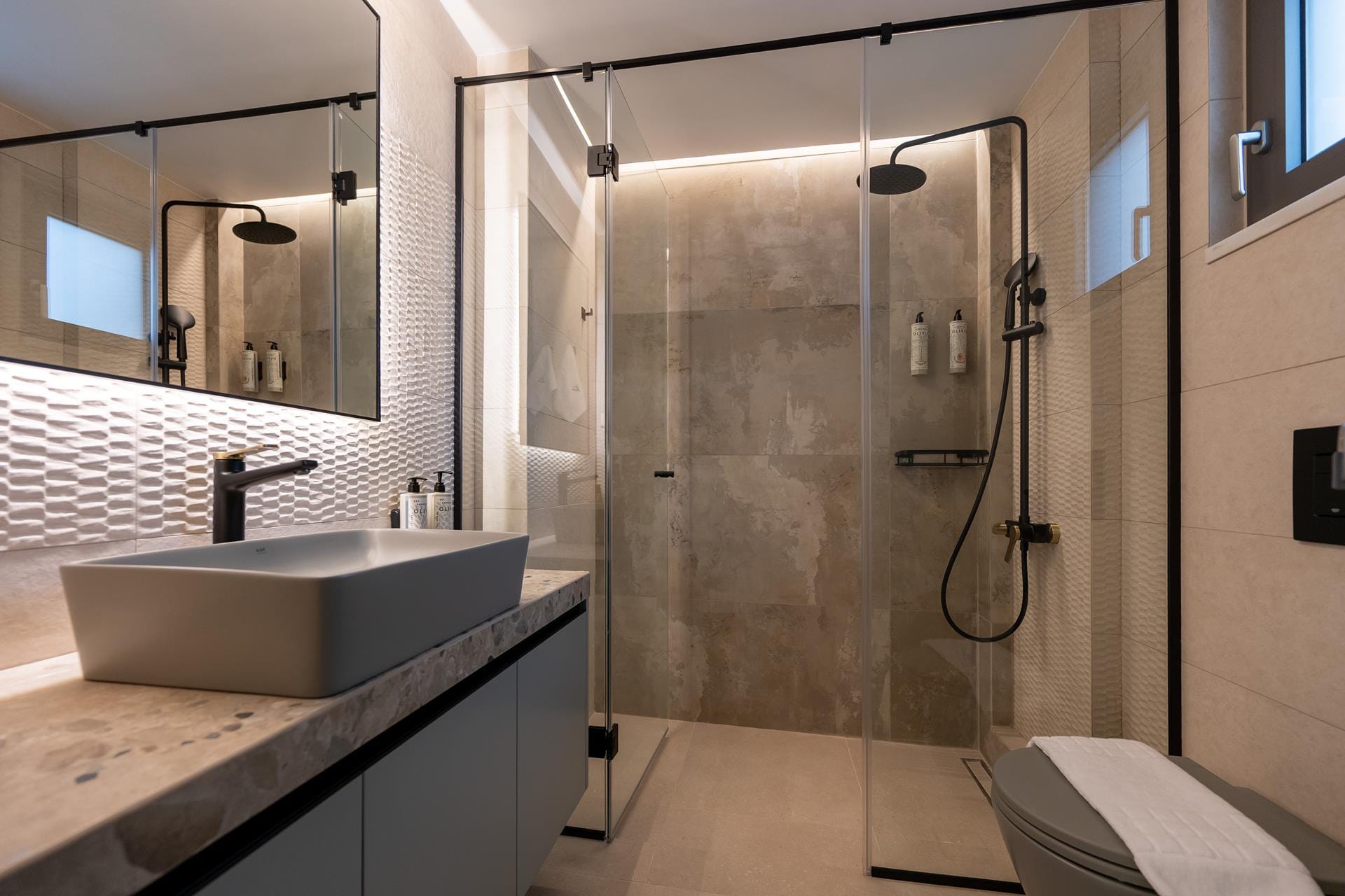 a bathroom with a glass shower
